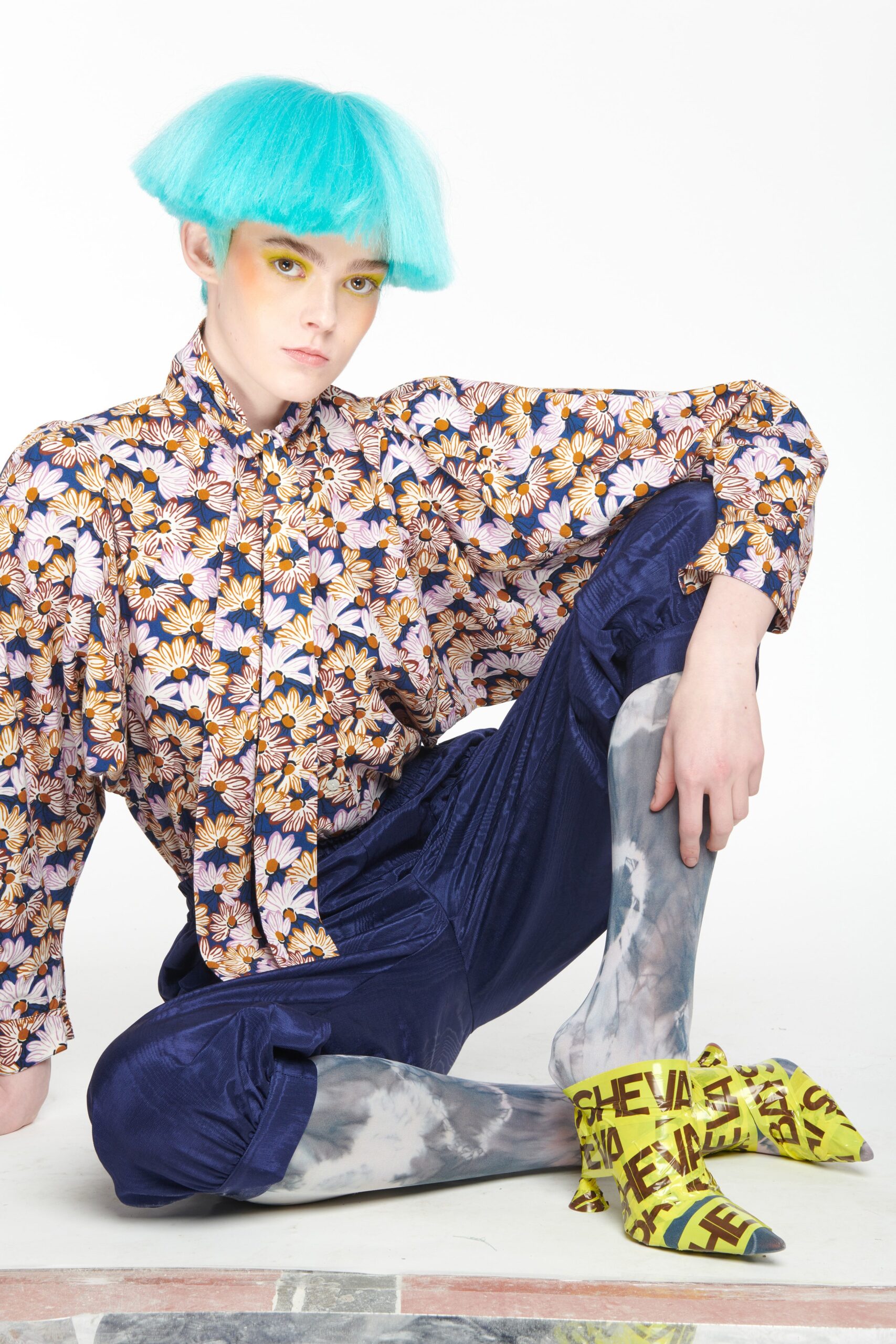 multi-colored relaxed shirt with blue pants