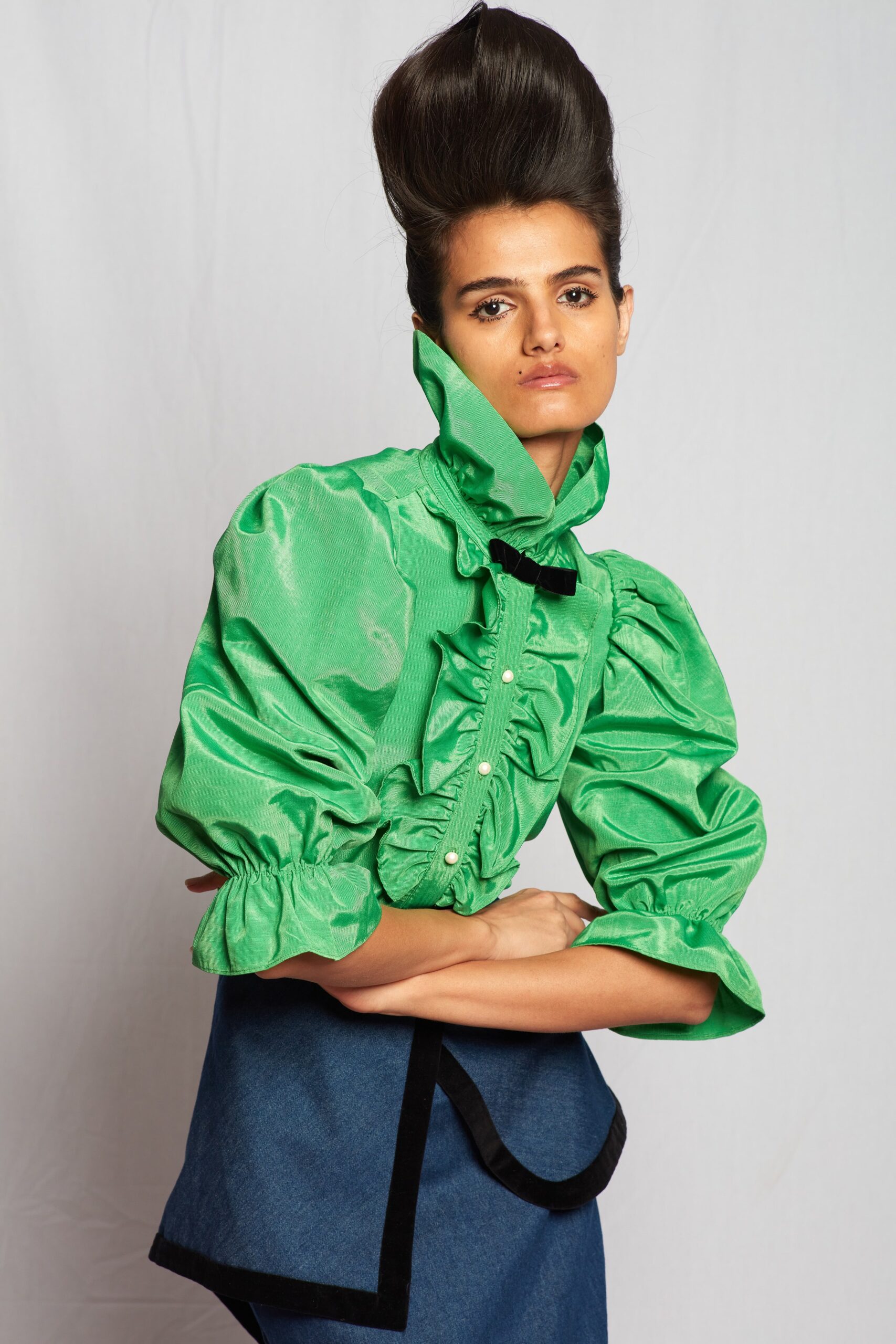 green silk ruffled blouse and blue denim skirt