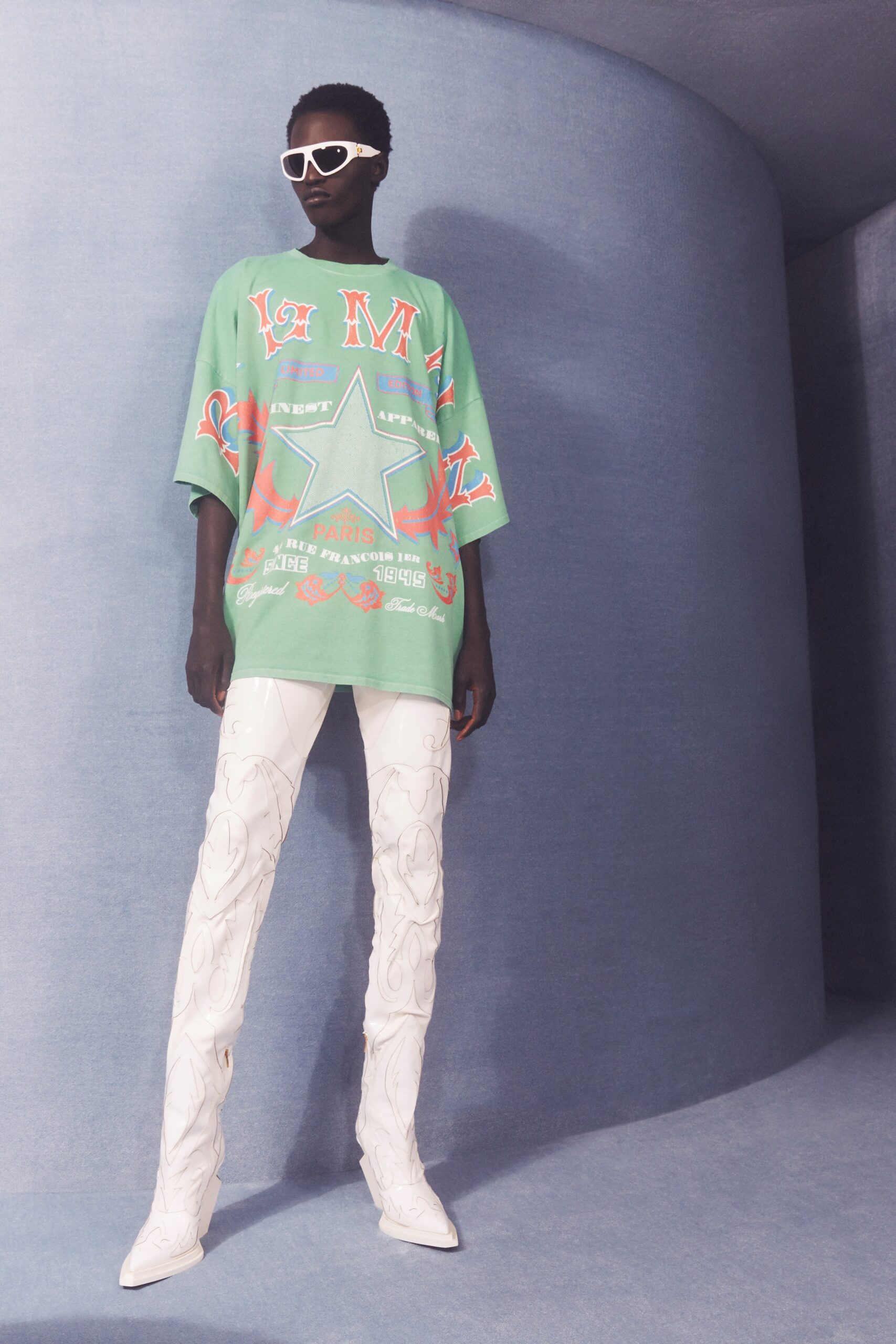 oversized green t-shirt with white pants