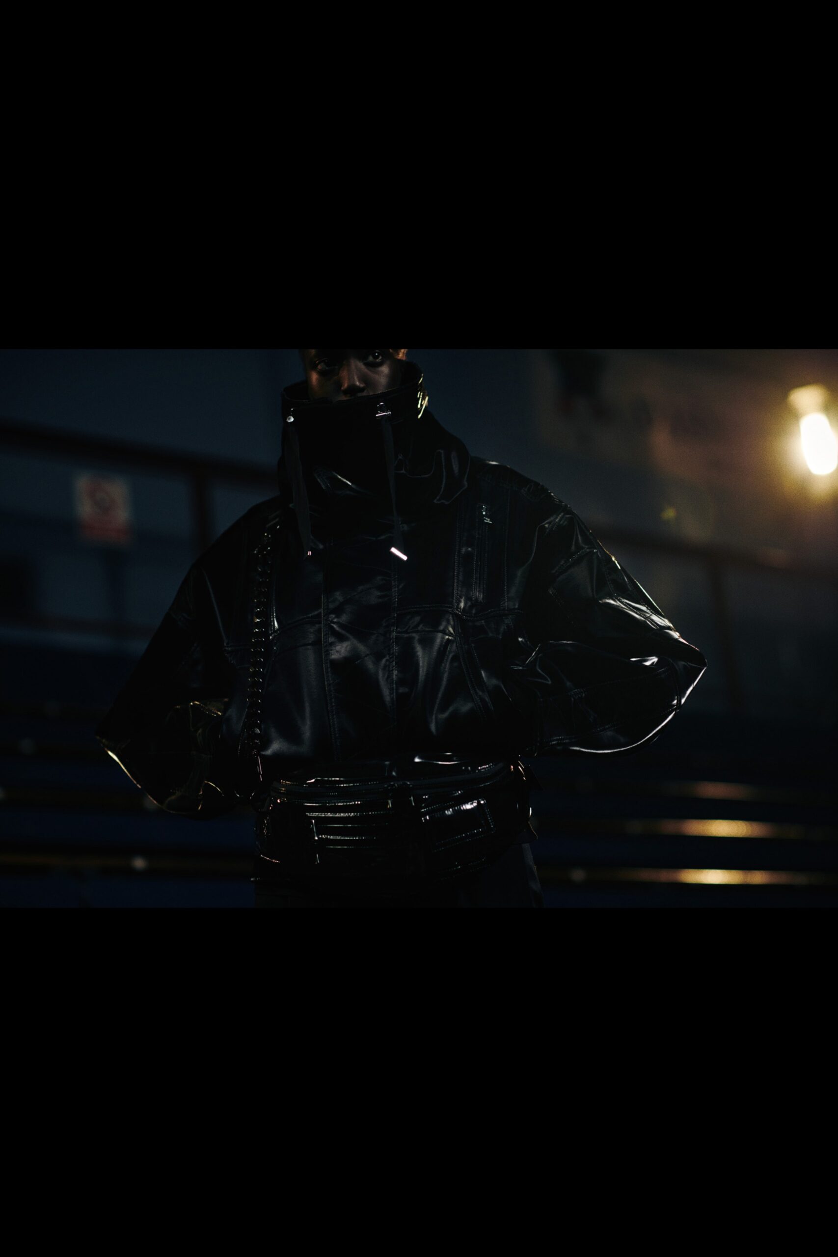 black vinyl jacket and pants