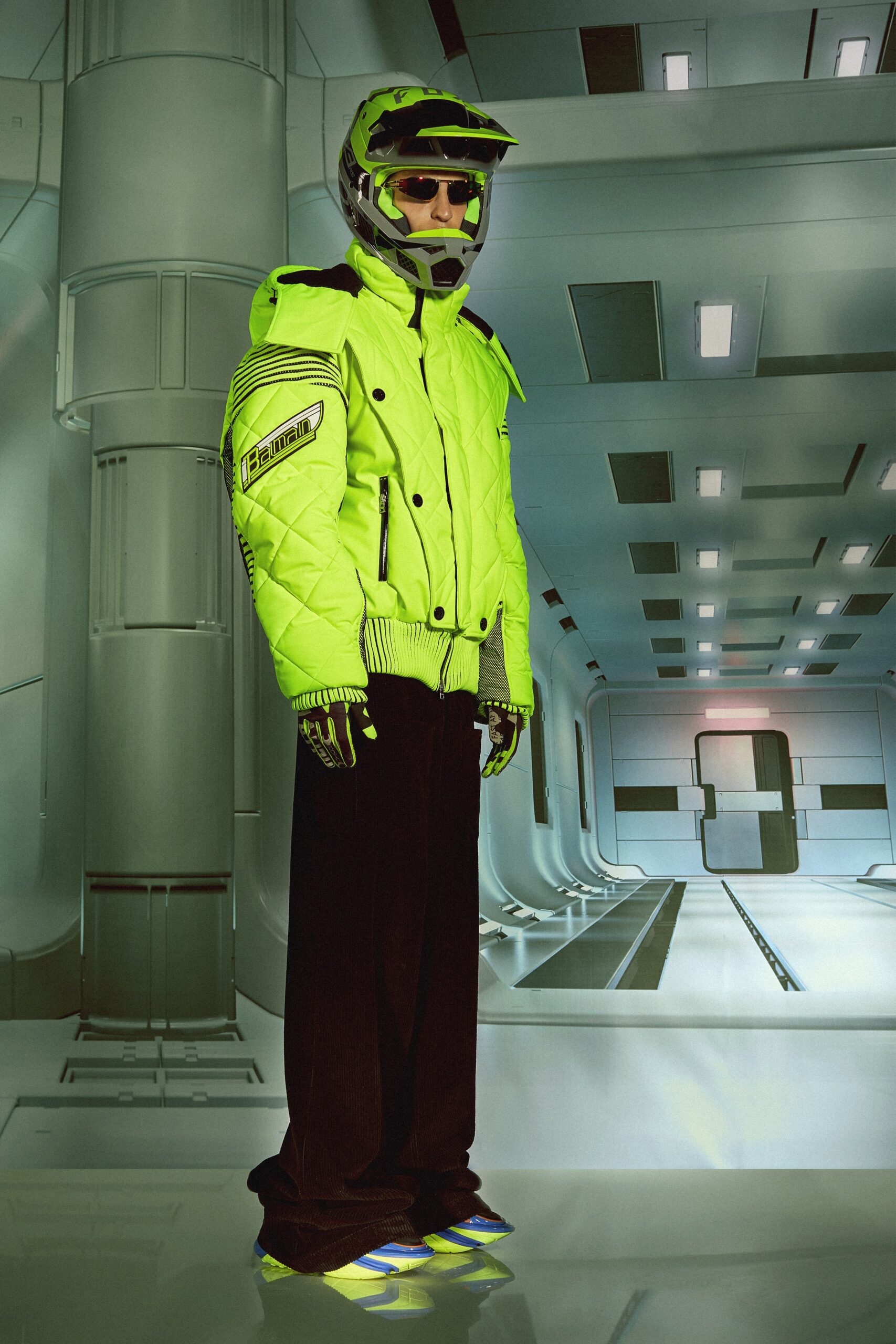 neon green vinyl jacket and black pants