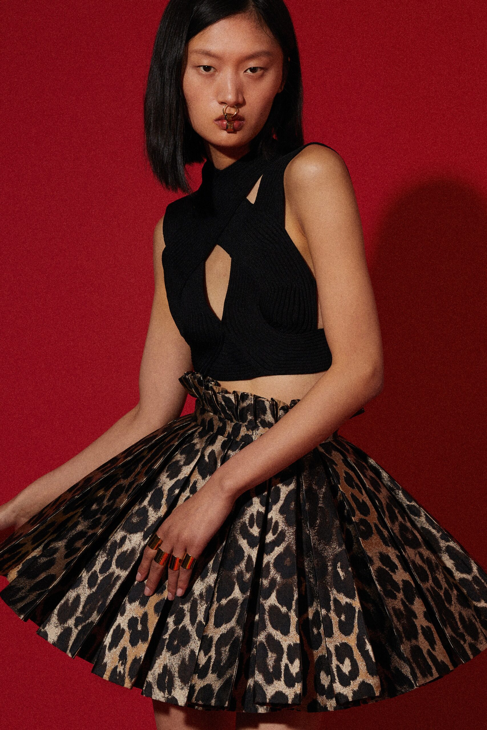 black cutout top and leopard print skirt