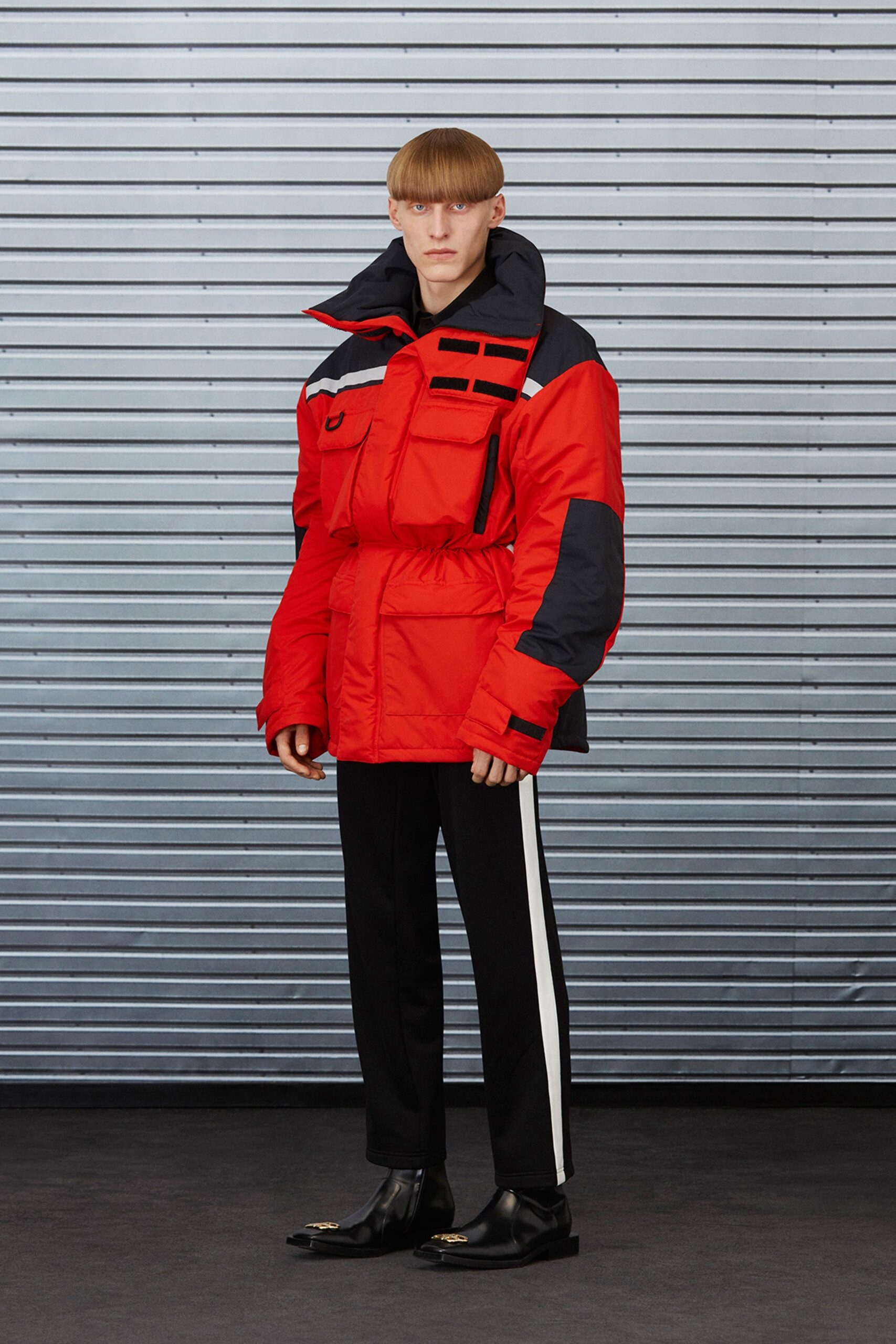 red and black relaxed jacket with slim pants