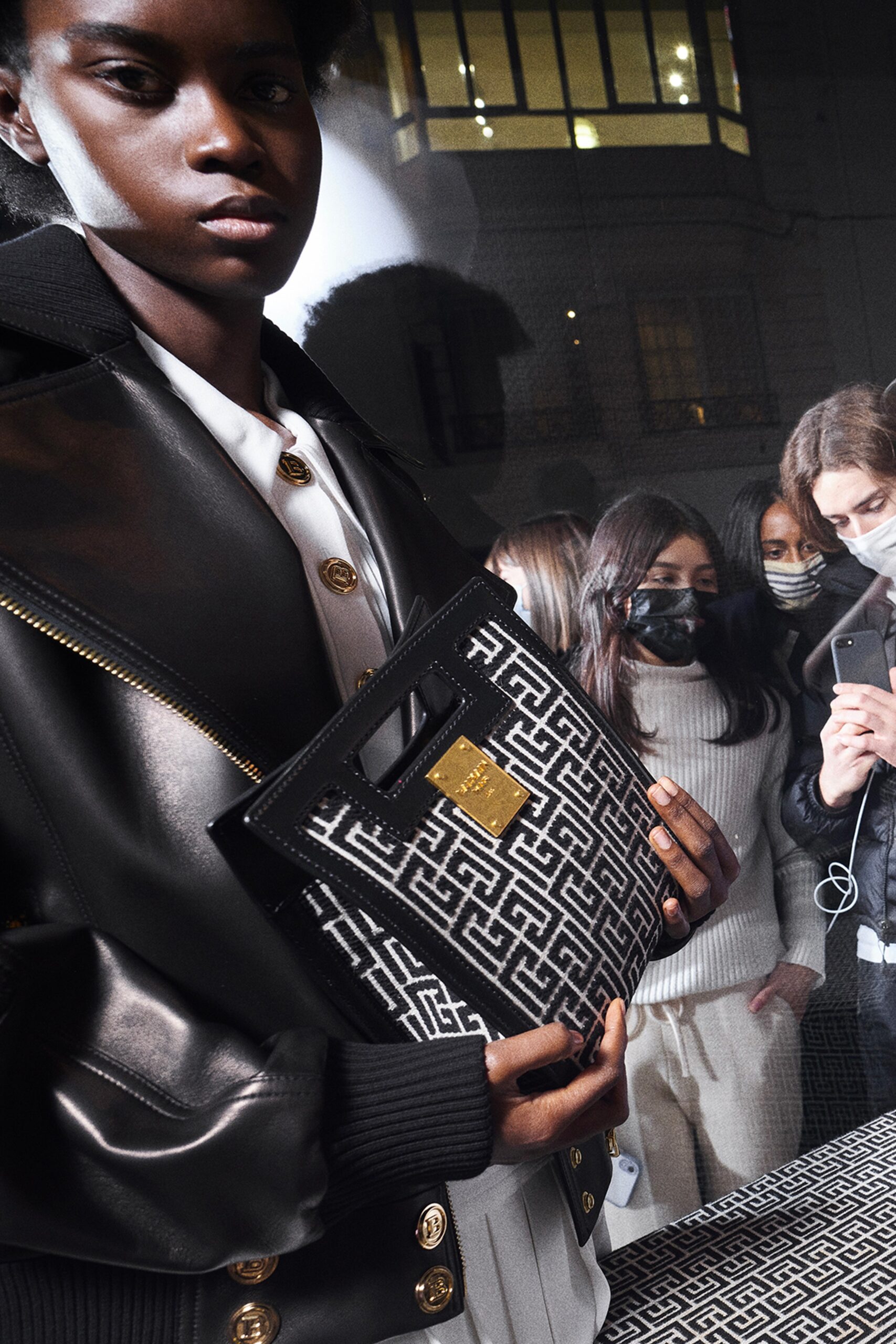 black leather fitted jacket with white shirt