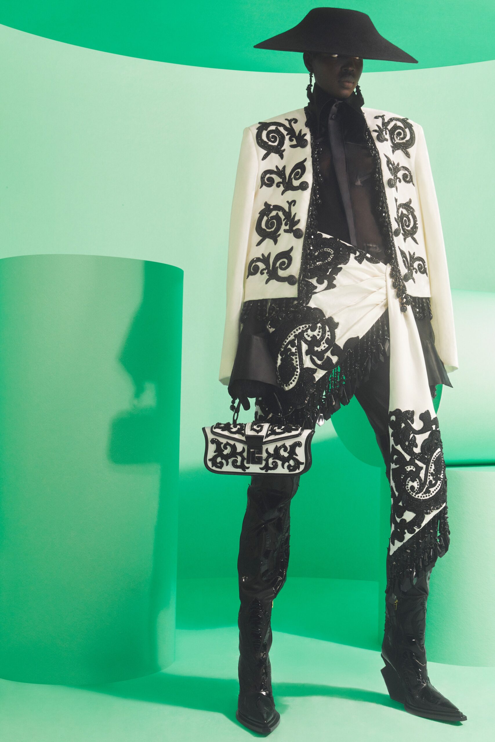 embroidered black and white jacket with fitted pants