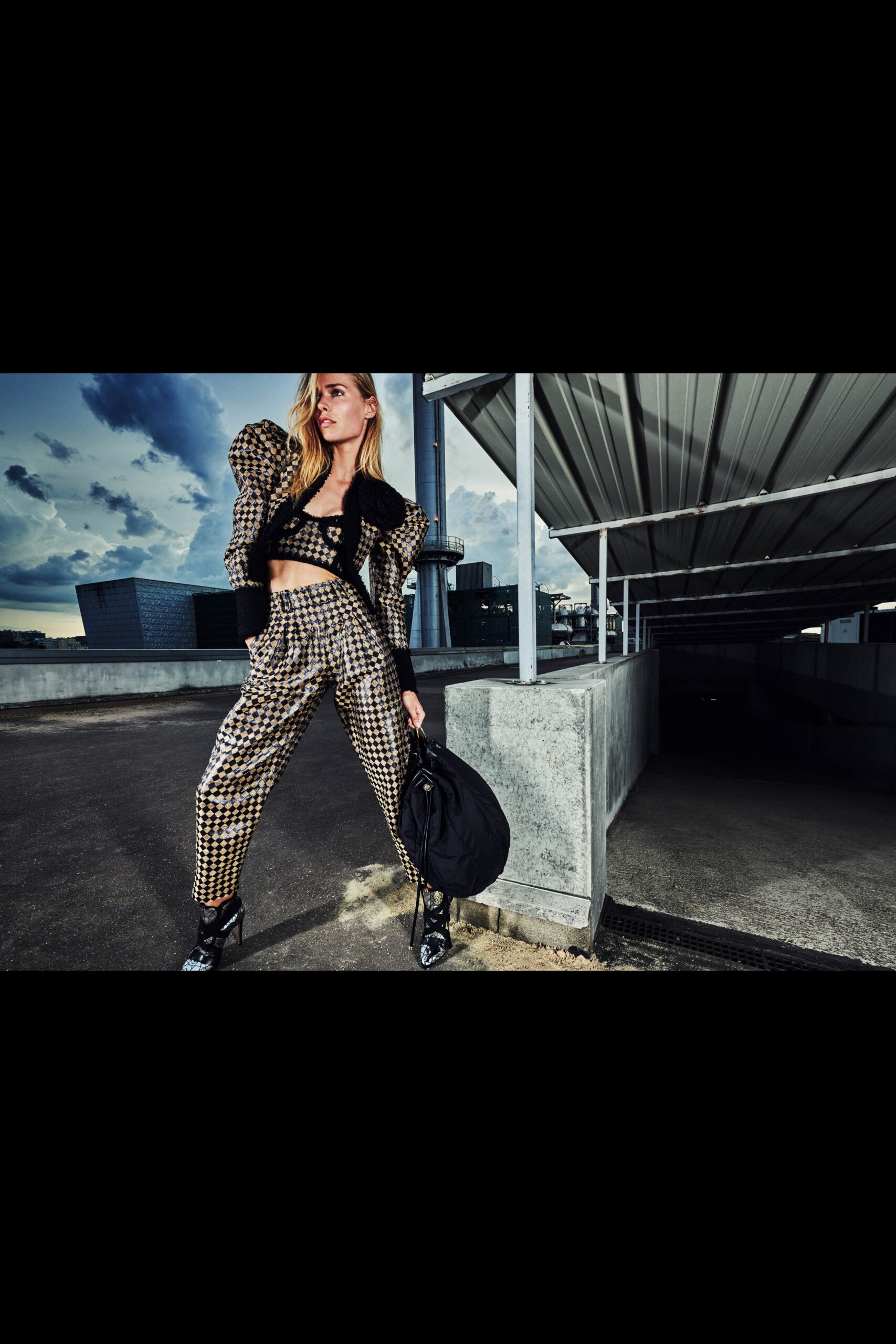 black fitted jacket with checked pants