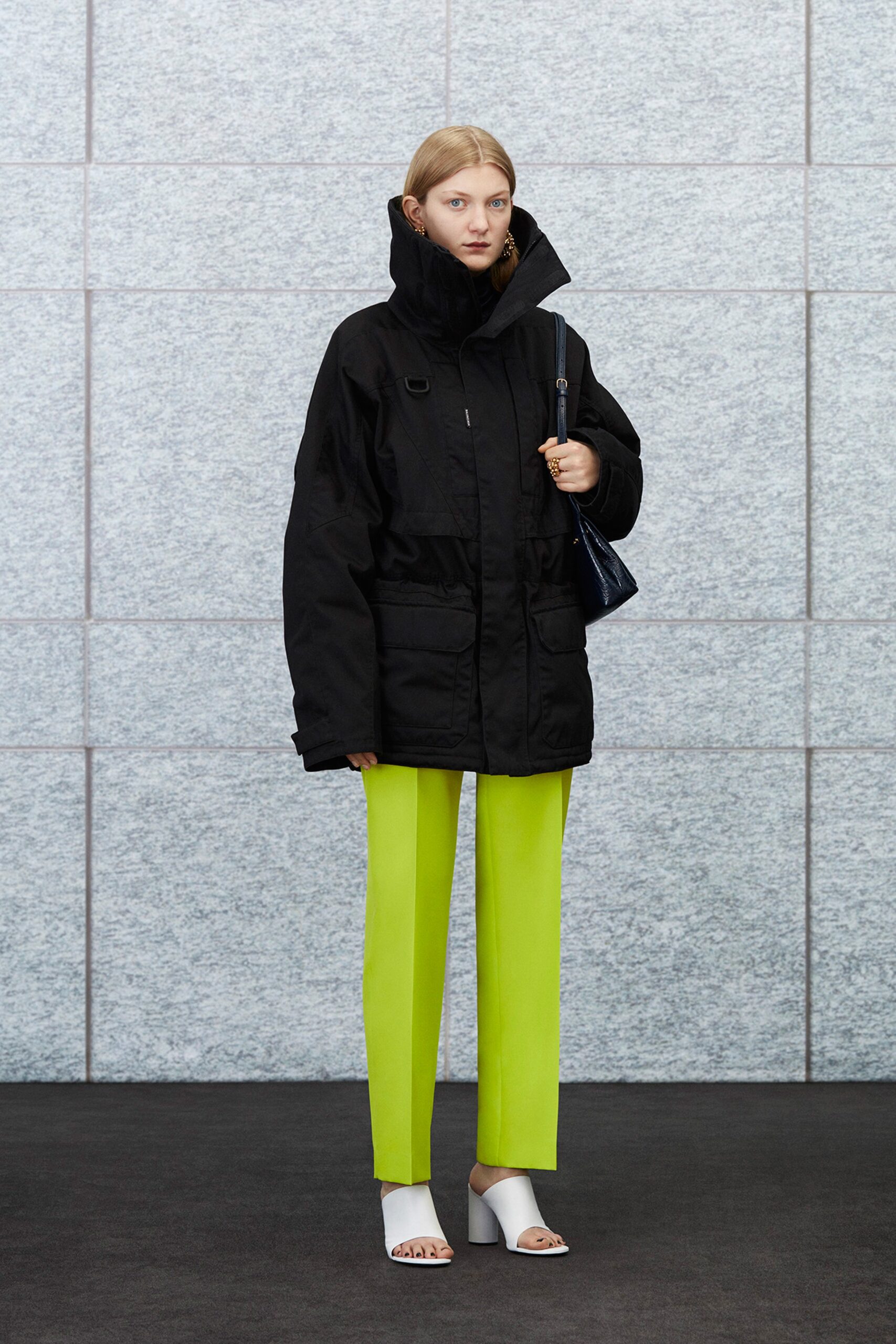 black oversized jacket with green pants