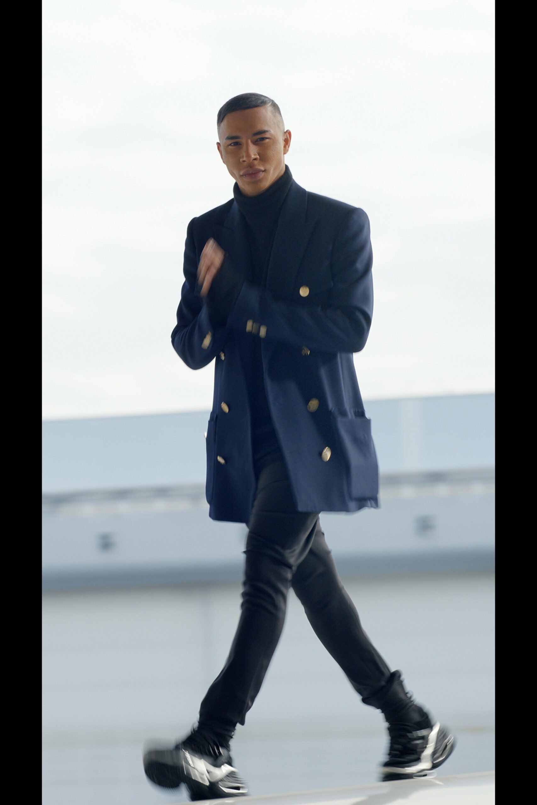 blue tailored blazer with black pants