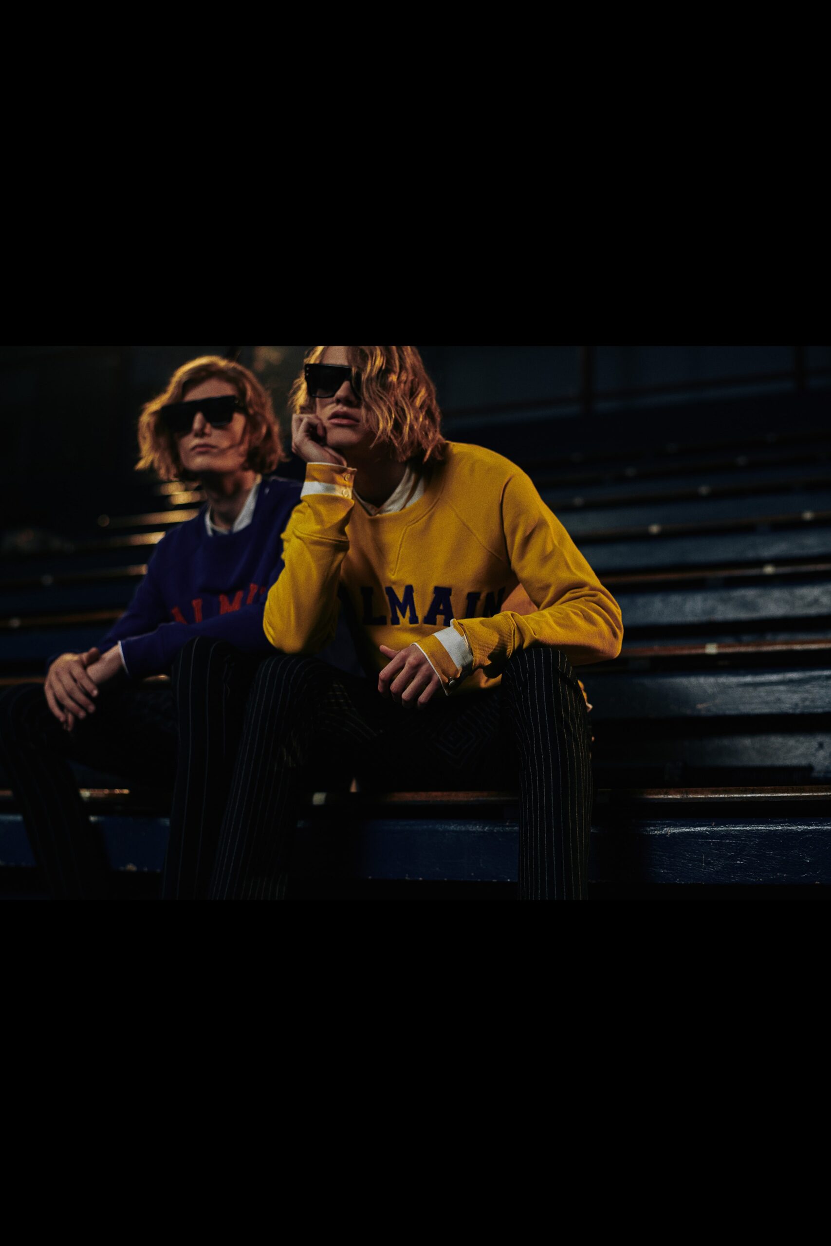 yellow and purple relaxed sweaters