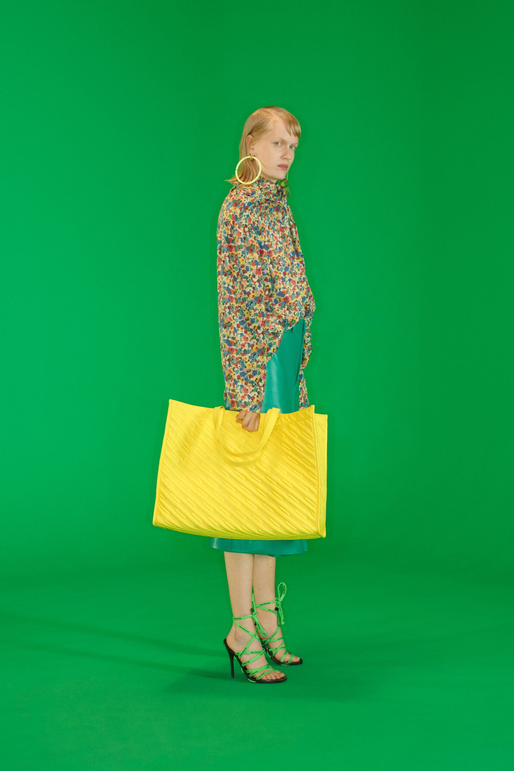 multi-colored blouse with blue skirt