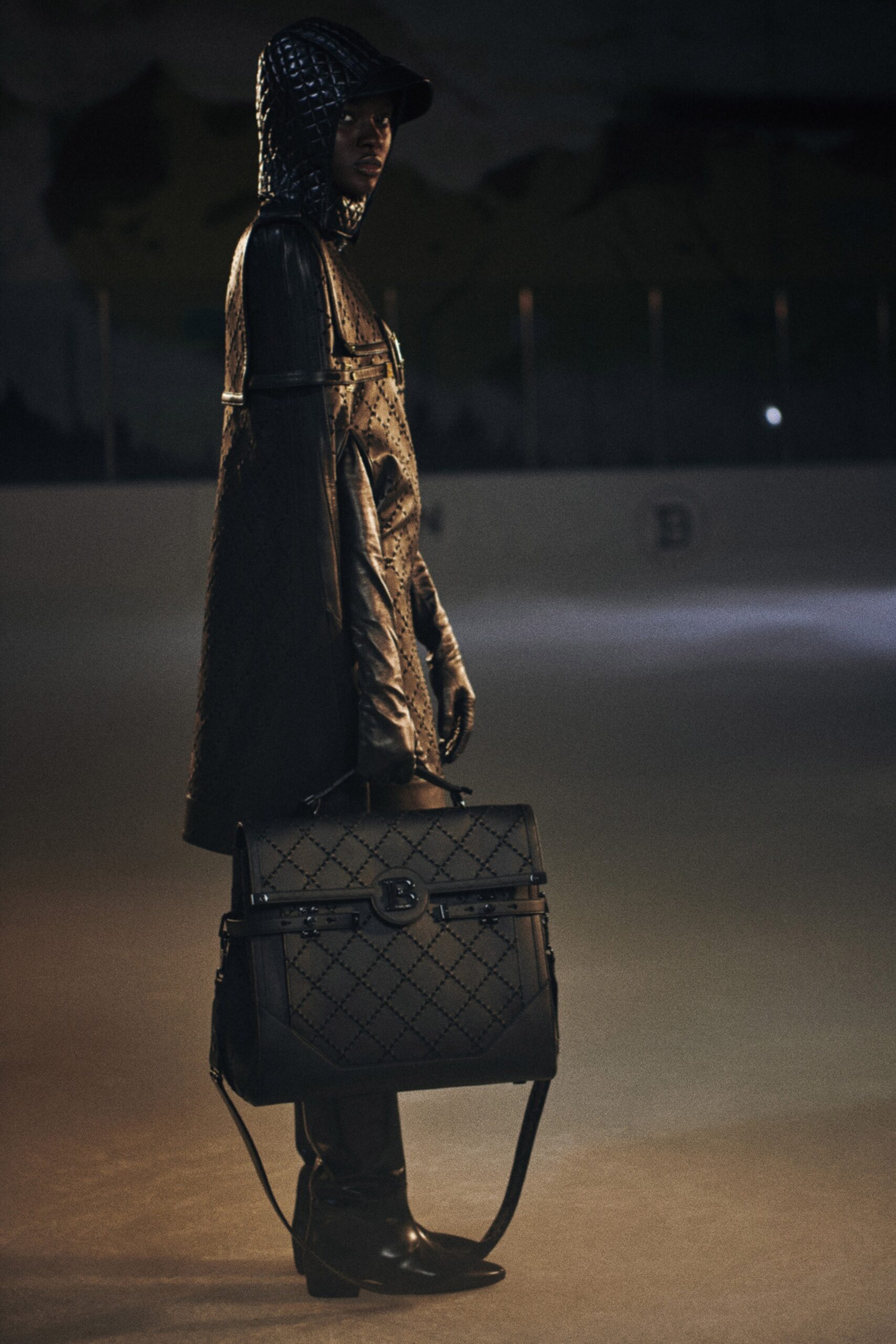 black leather cape and pants