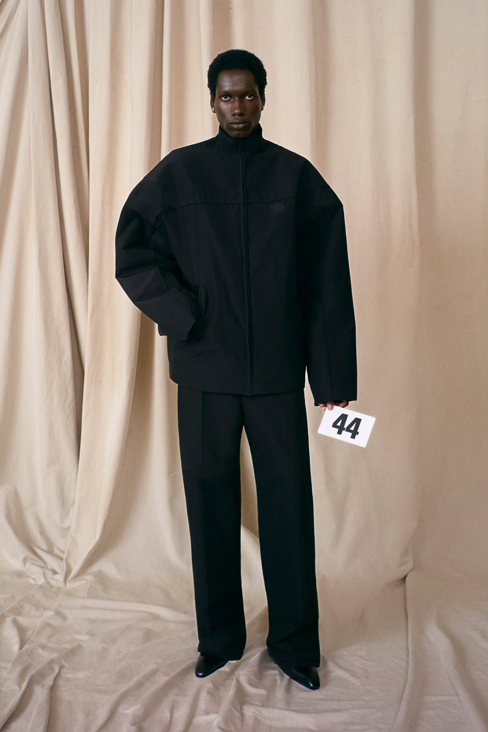 oversized black jacket and tailored pants
