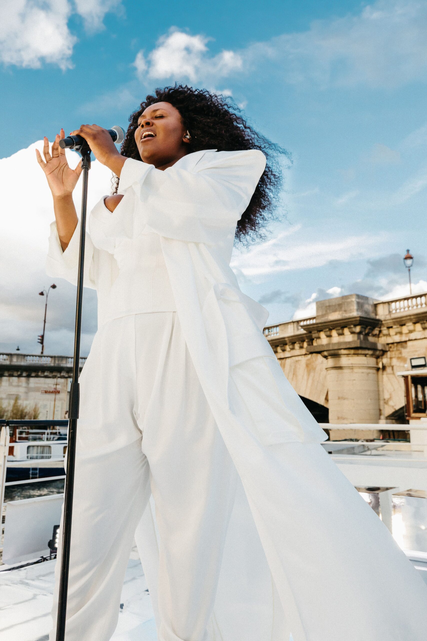 white fitted jumpsuit and coat