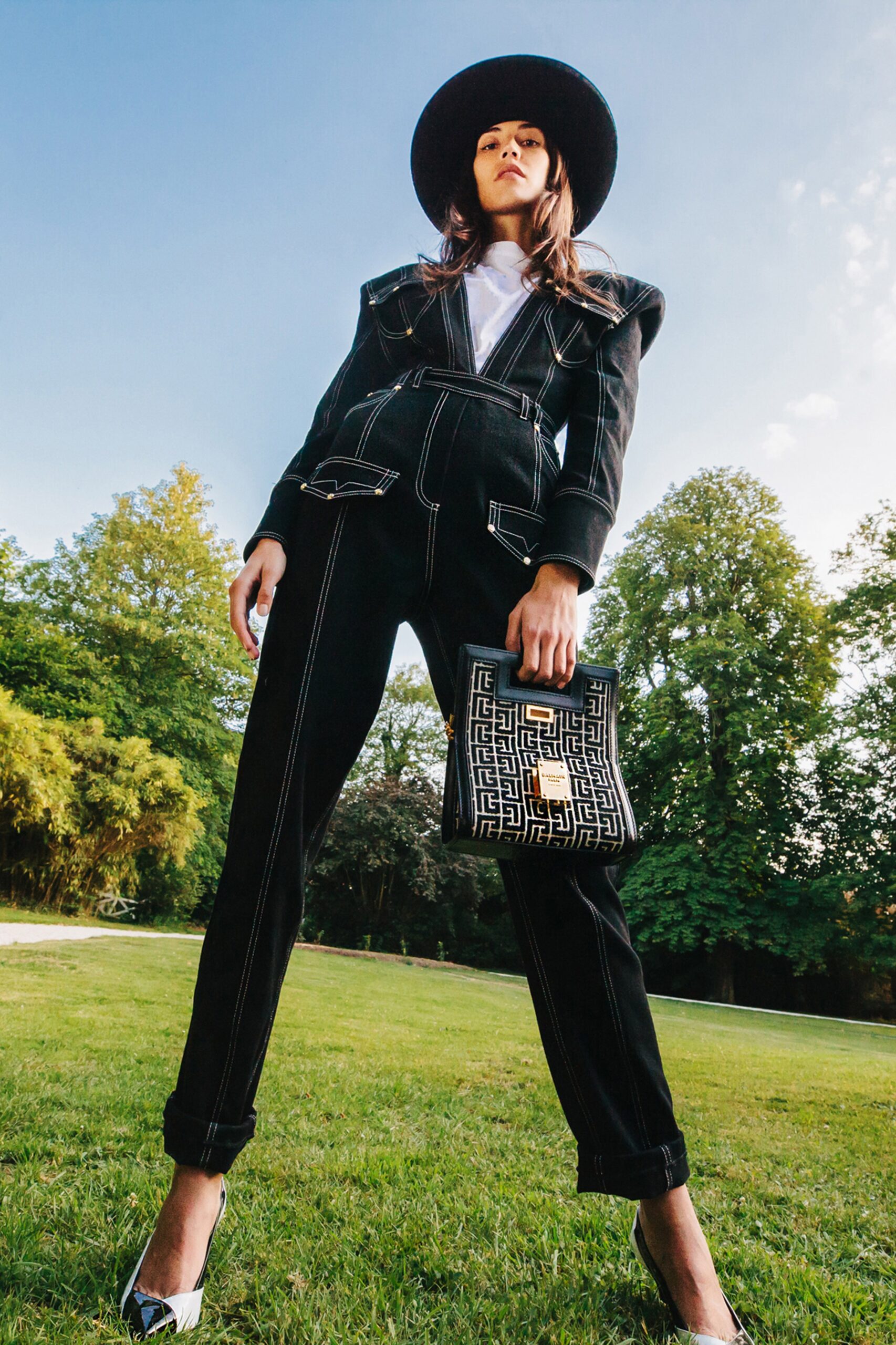 black fitted jumpsuit with hat