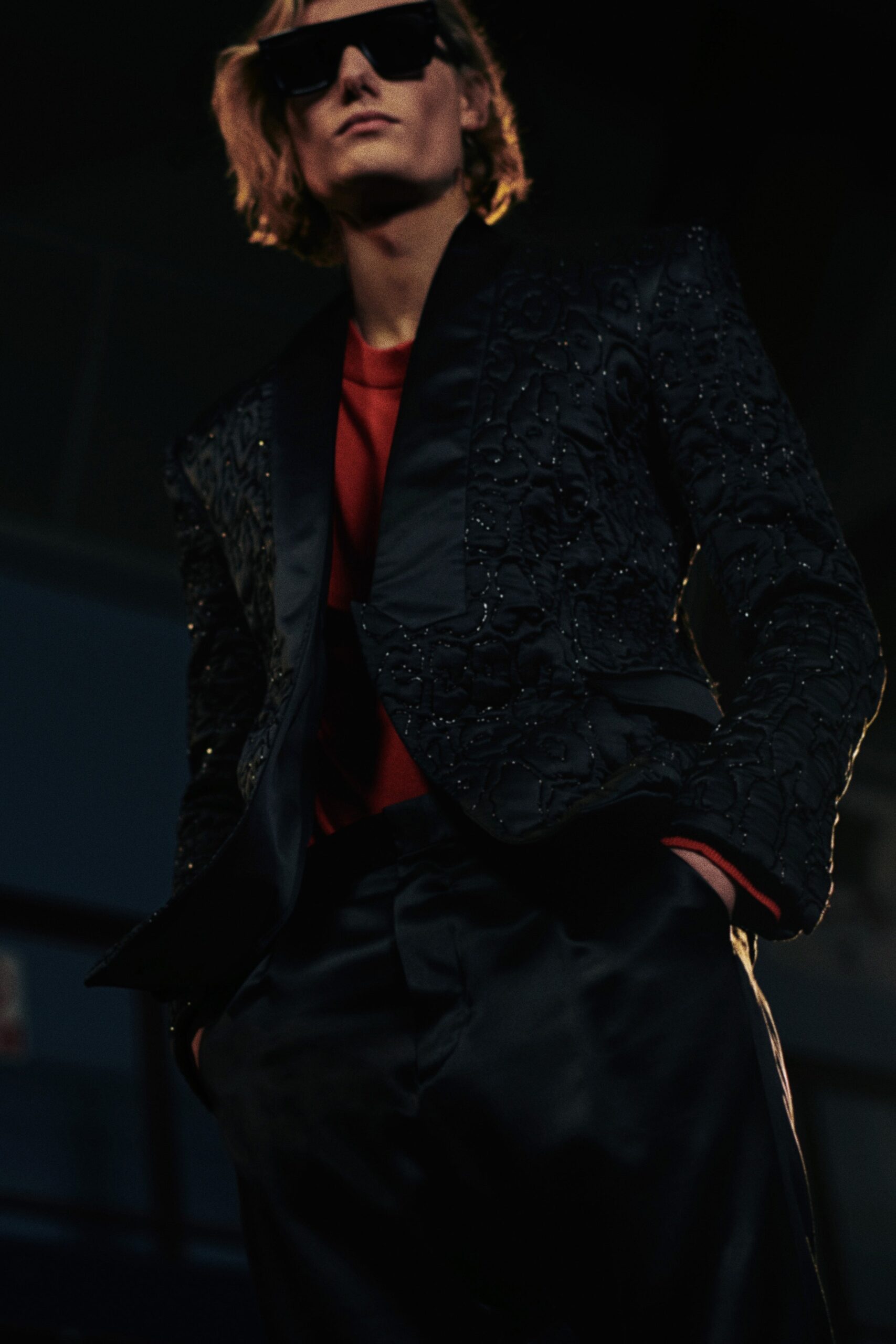 black embroidered blazer with red top