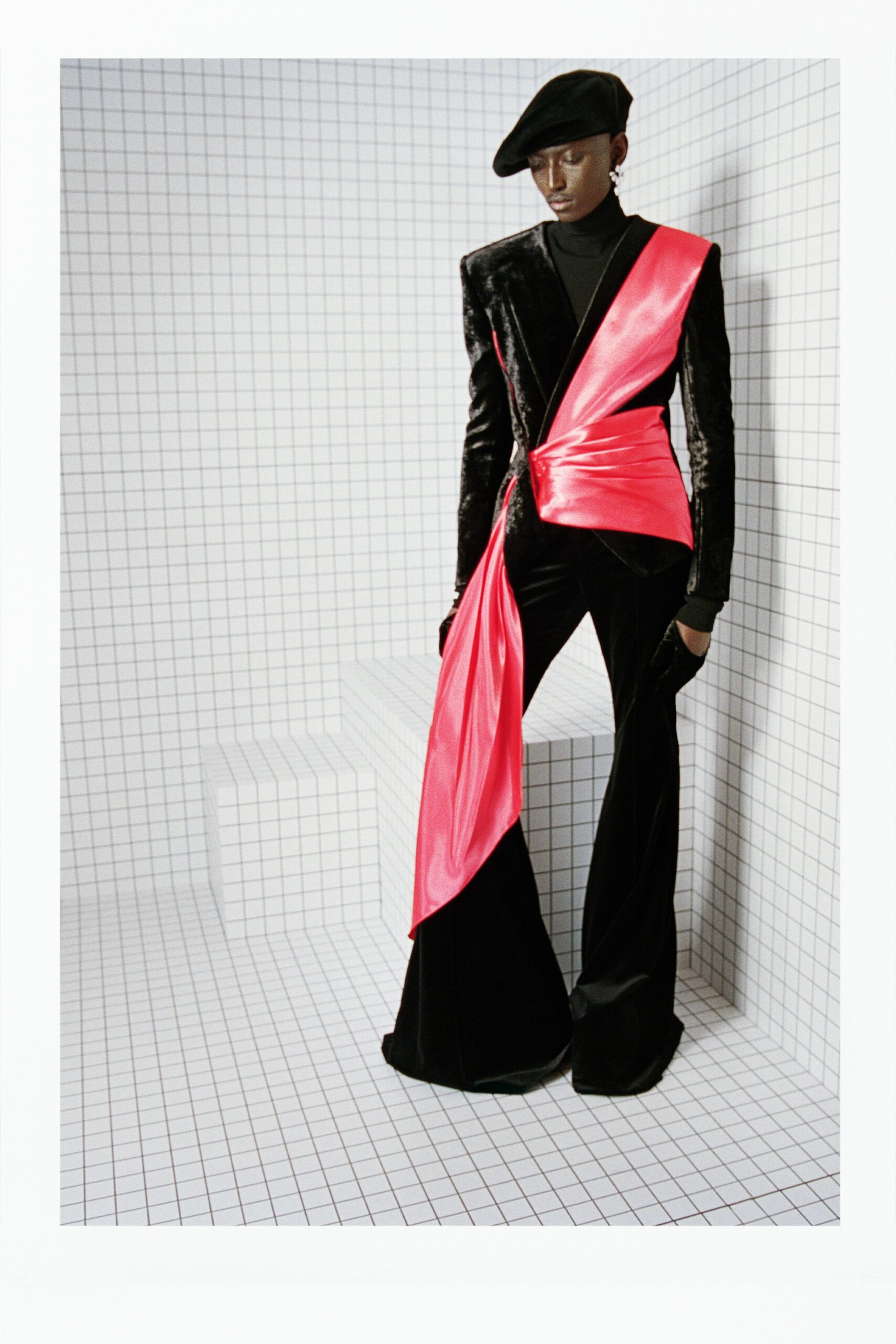 black velvet blazer with pink sash