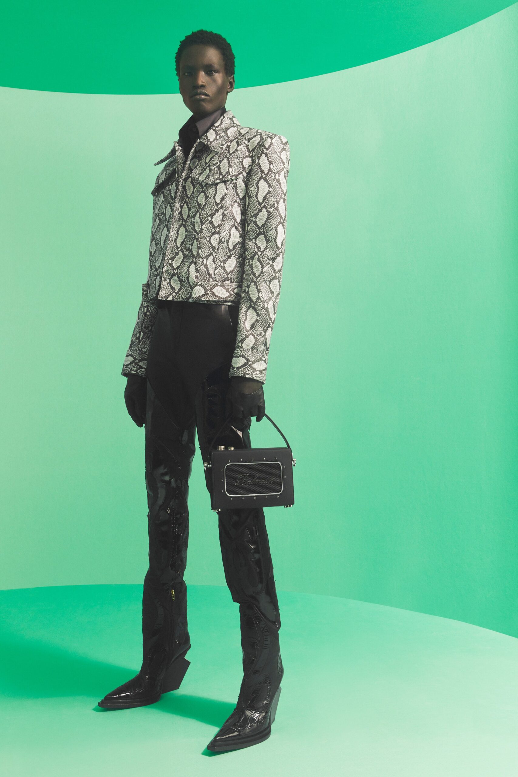 black leather long-sleeve collared fitted printed jacket