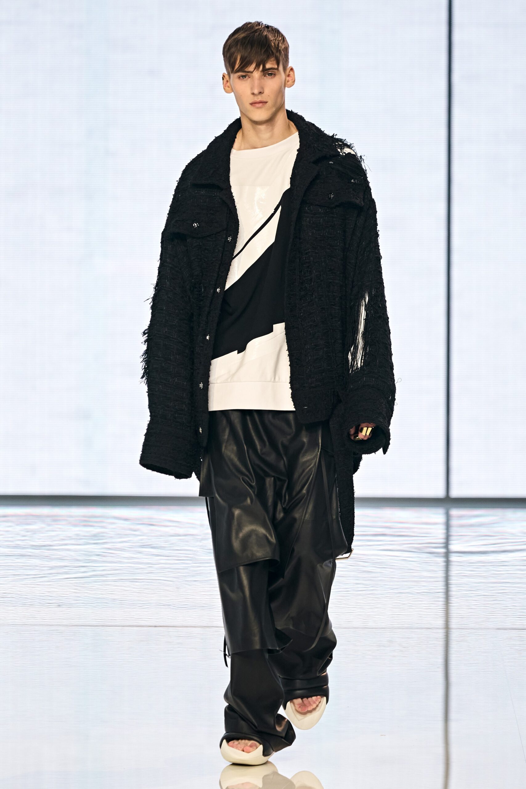 black wool coat with fringes