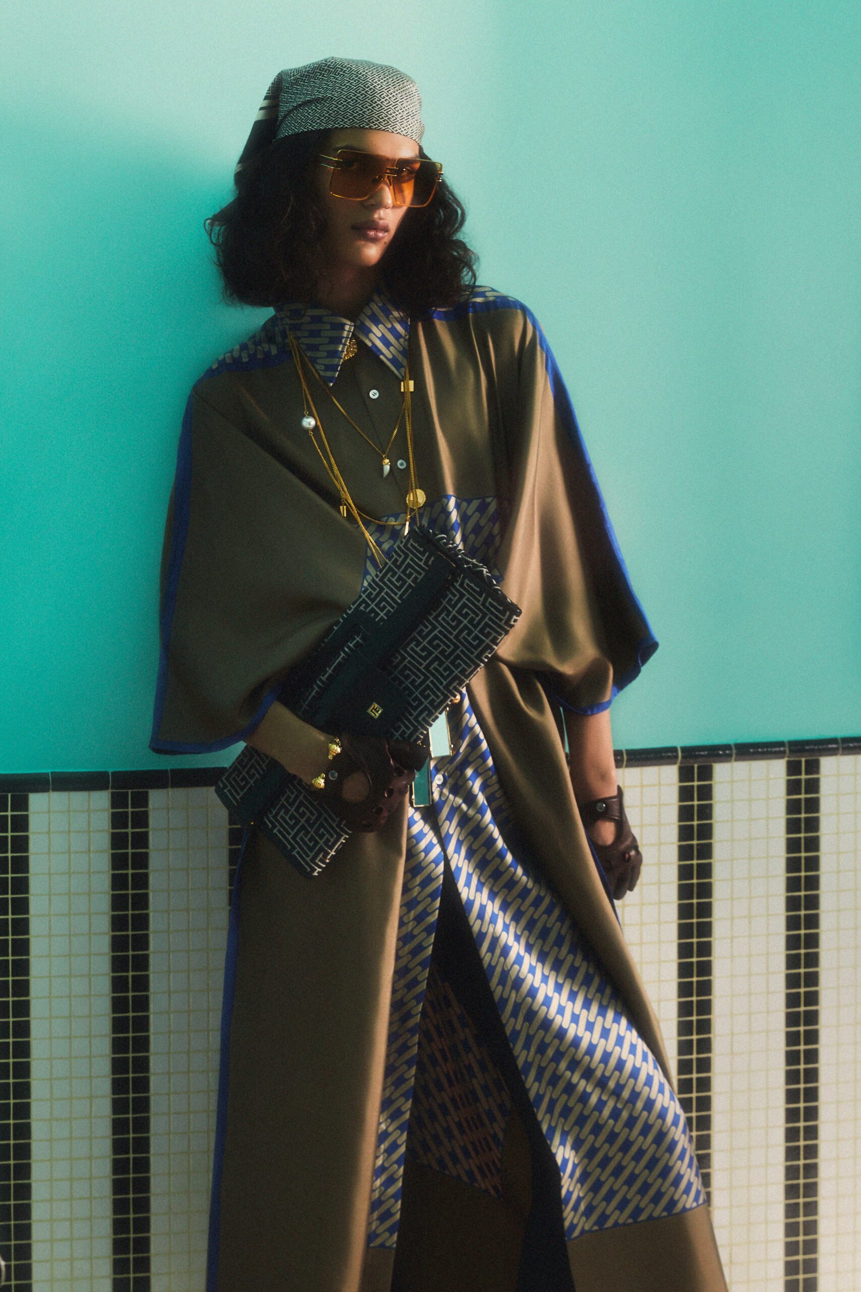 brown and blue silk cape