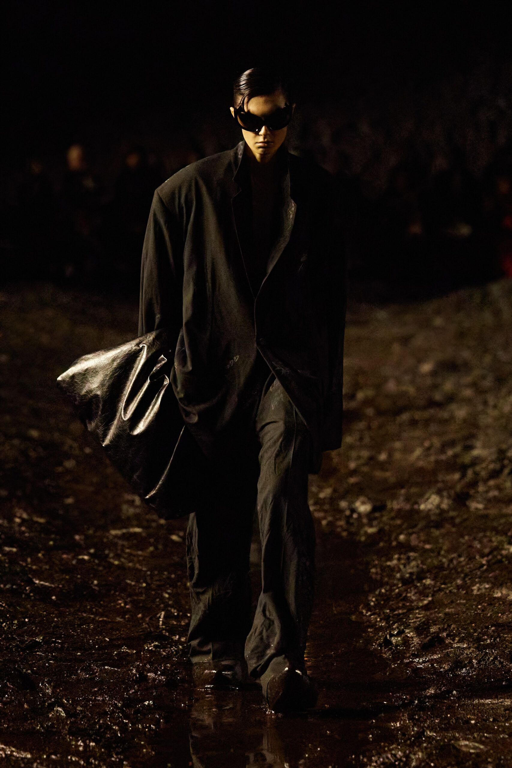 black oversized leather jacket and relaxed pants