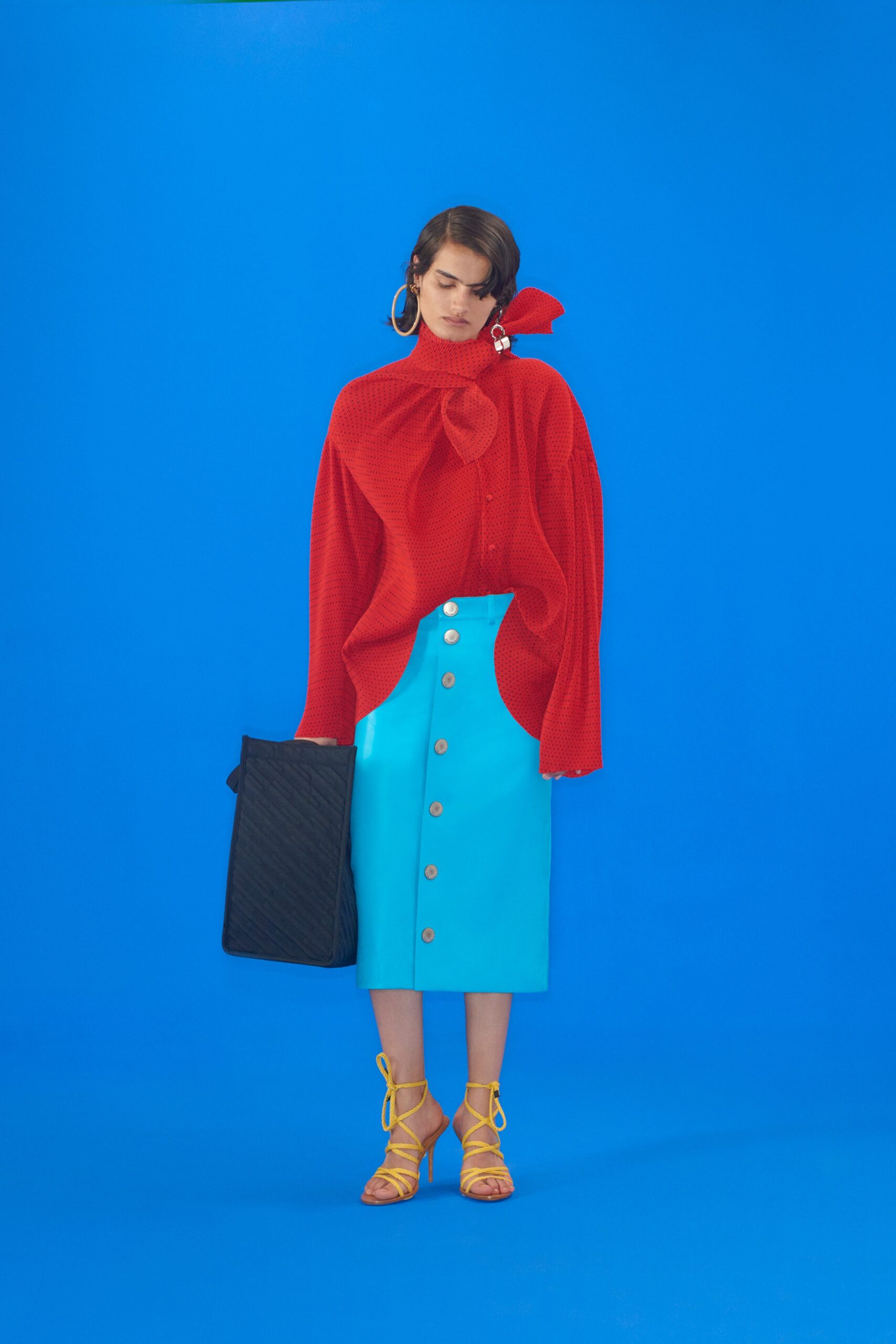 oversized red top and blue skirt