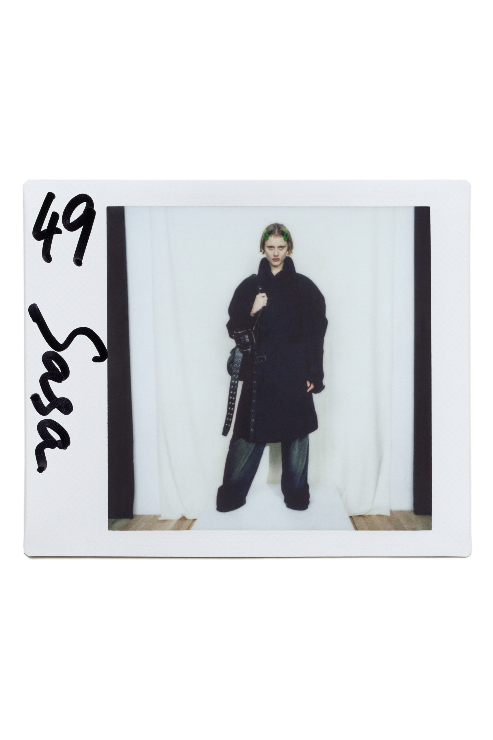 black wool long-sleeve collared oversized buttoned coat