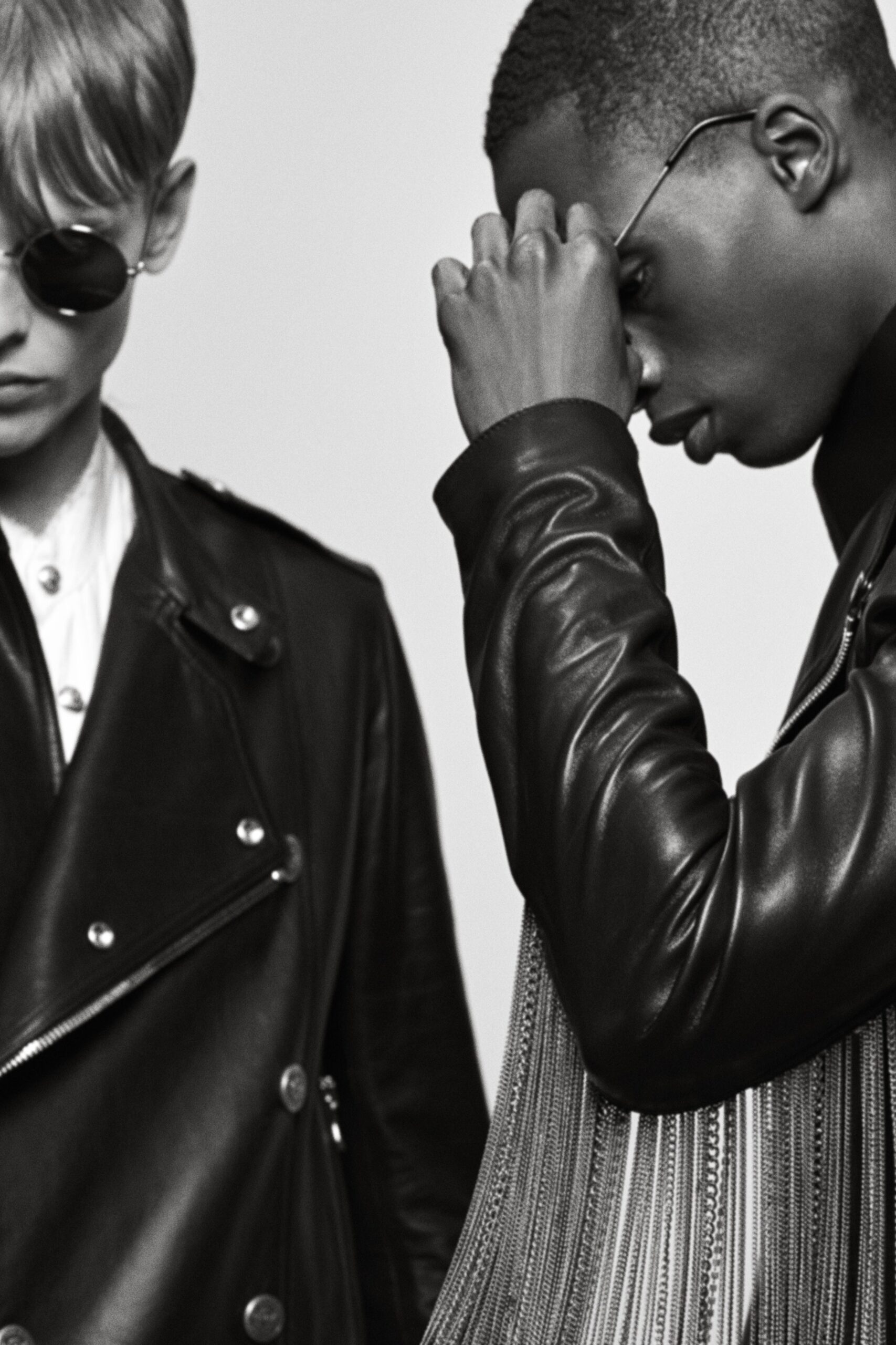 black leather fitted jacket and white shirt