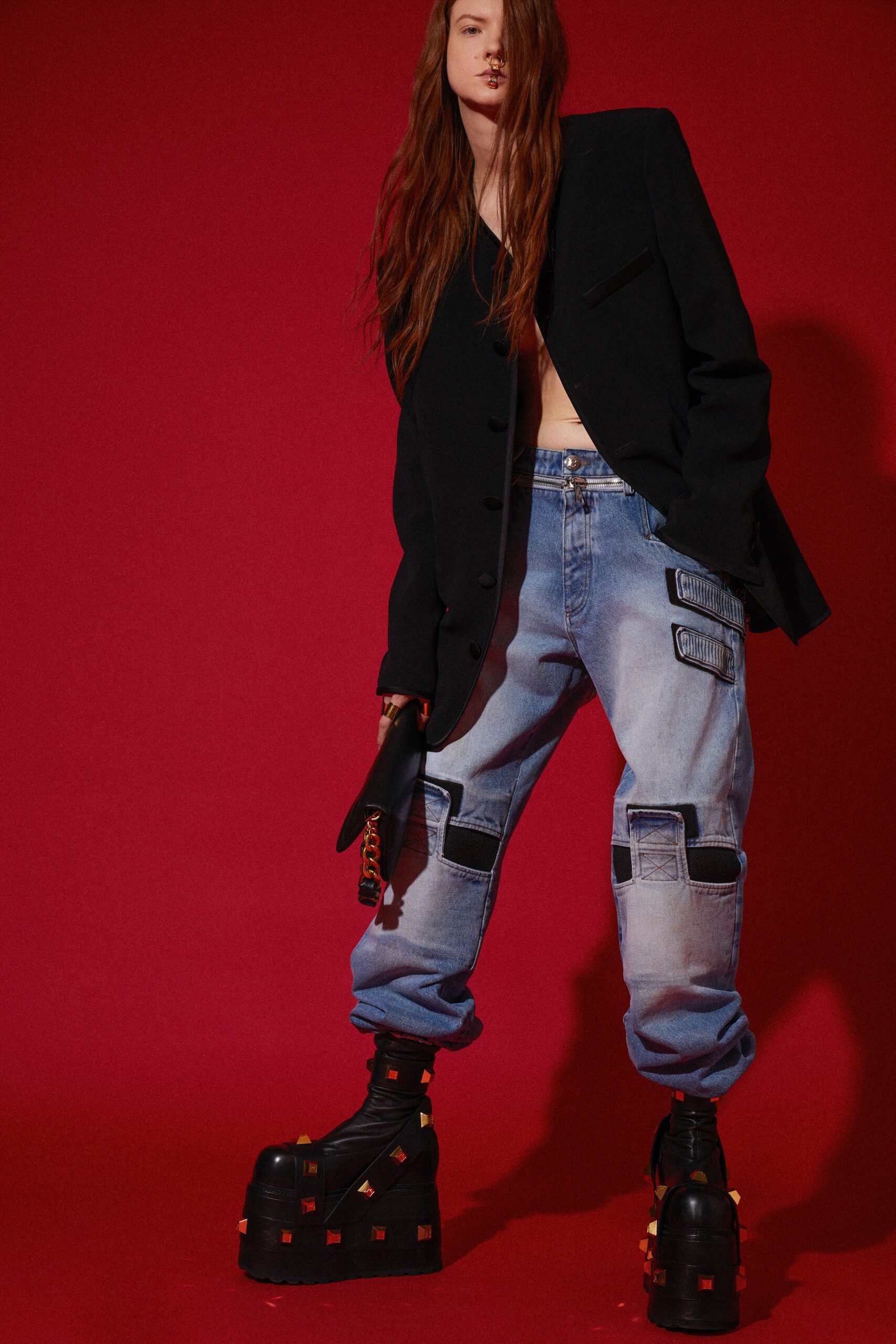 oversized black blazer with relaxed denim pants