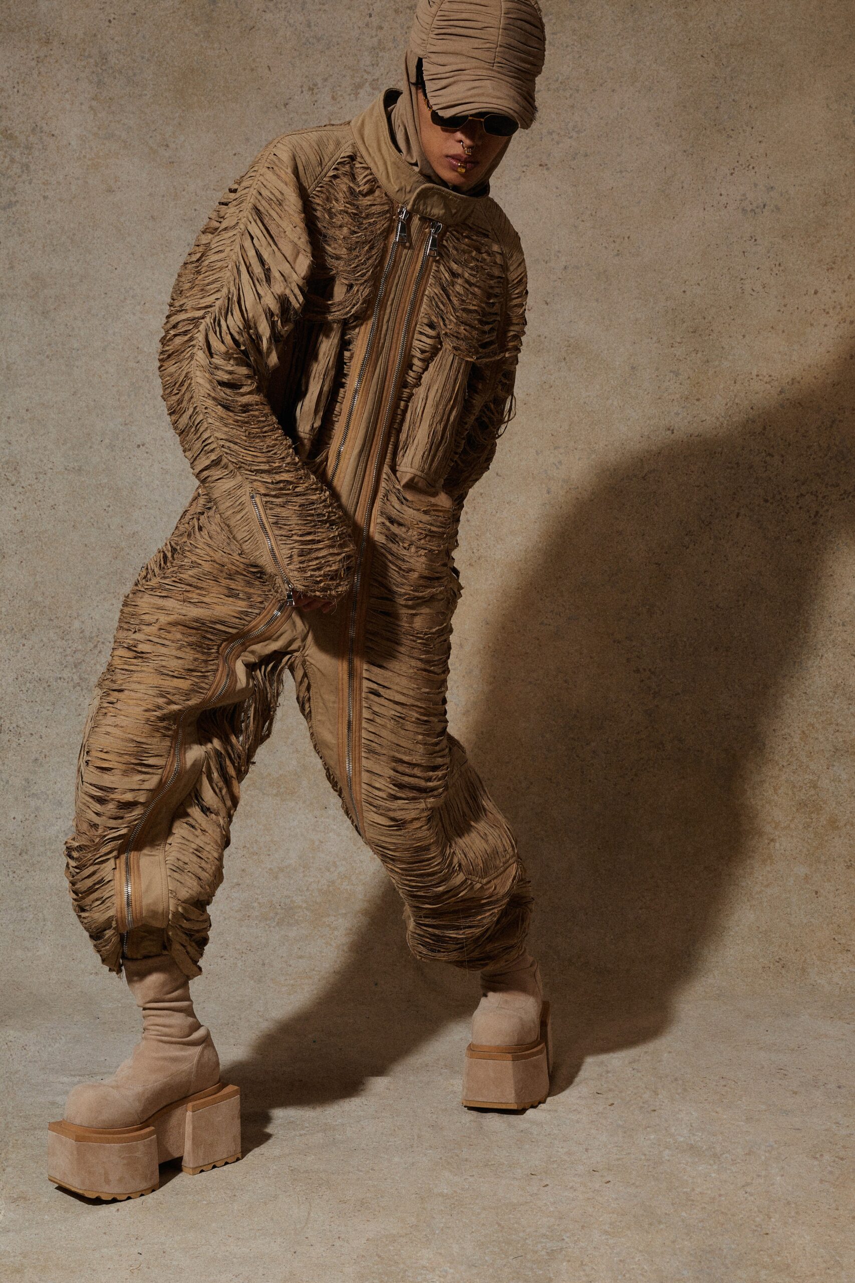 beige cotton long-sleeve collared relaxed zippered pleated jumpsuit