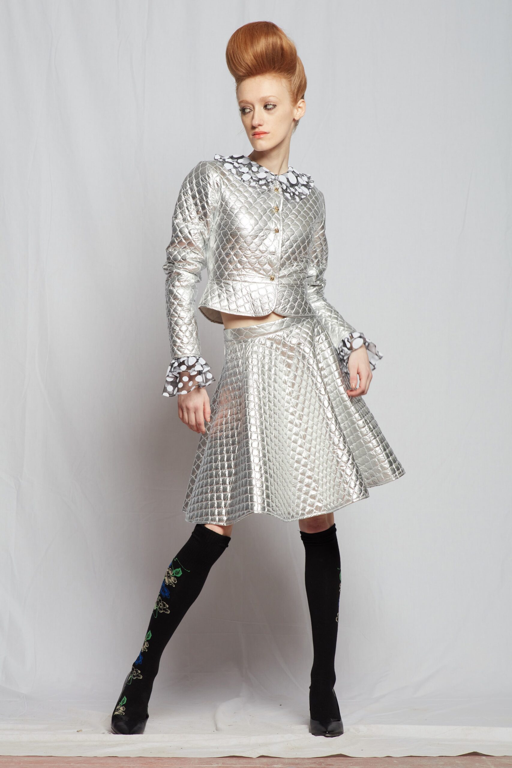 gray metallic long-sleeve collared fitted quilted shiny jacket