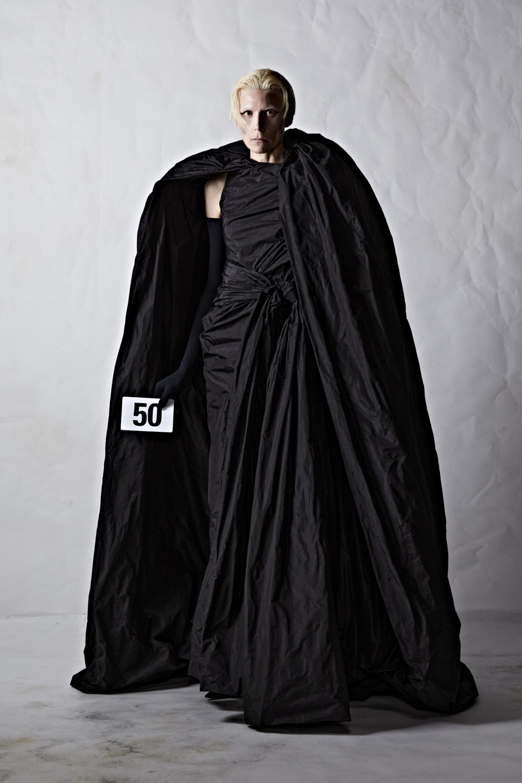 black silk gown with cape