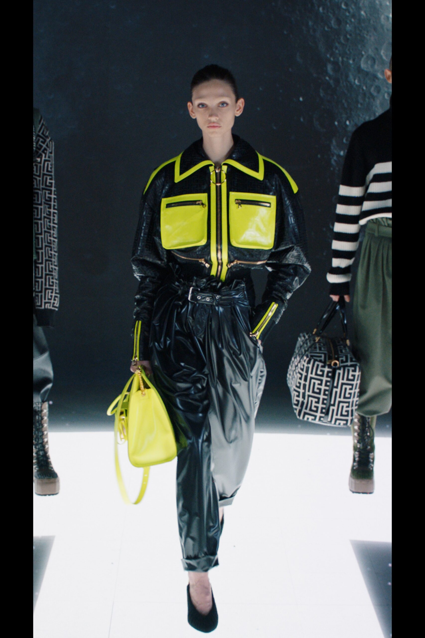 black vinyl jacket and pants