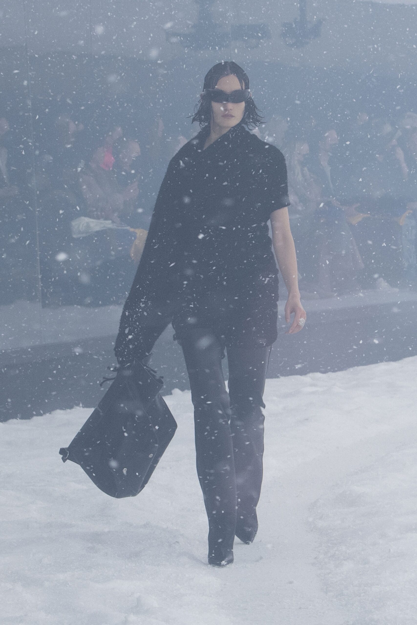black fitted top and slim pants