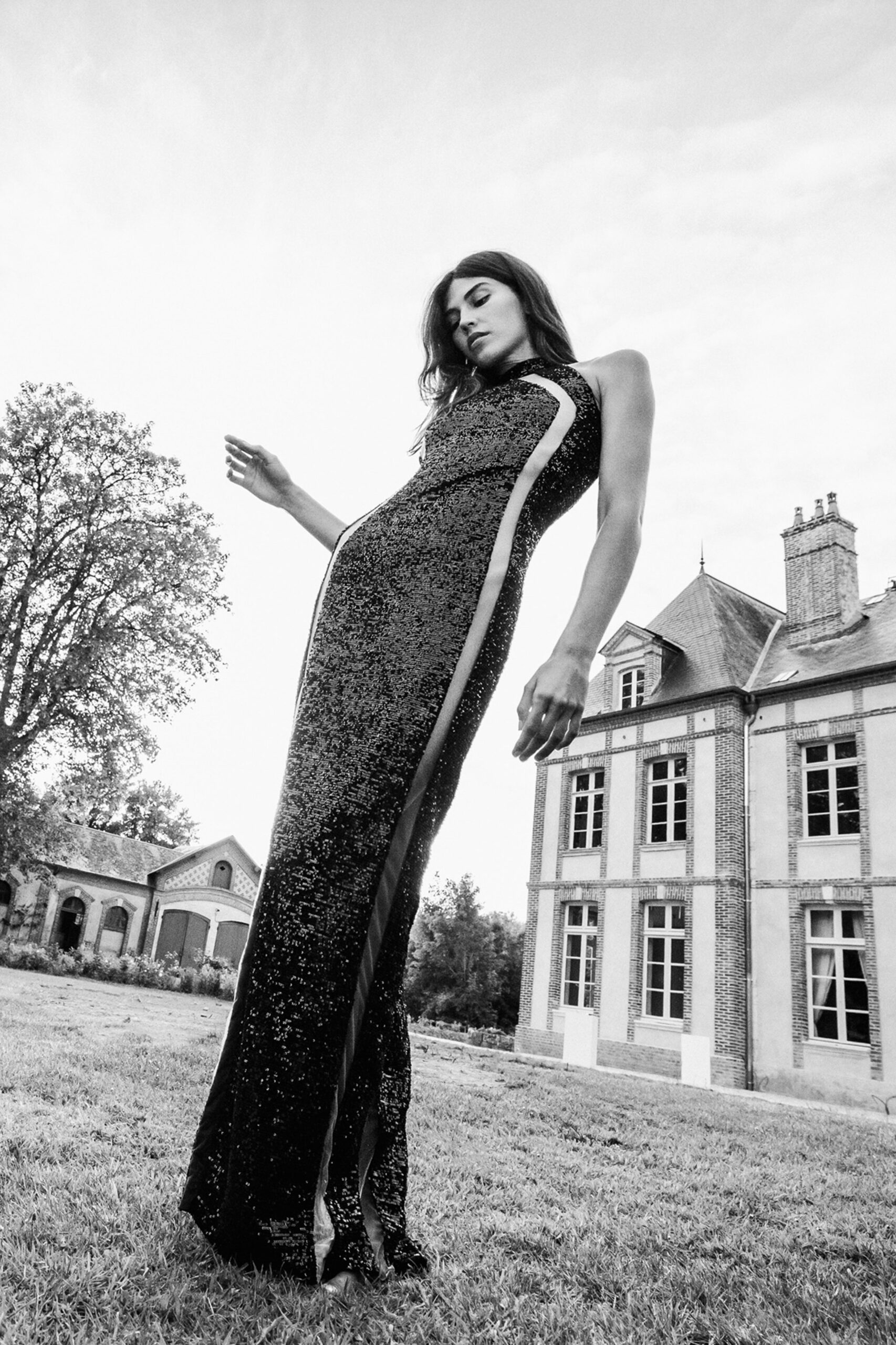 black sequin sleeveless gown