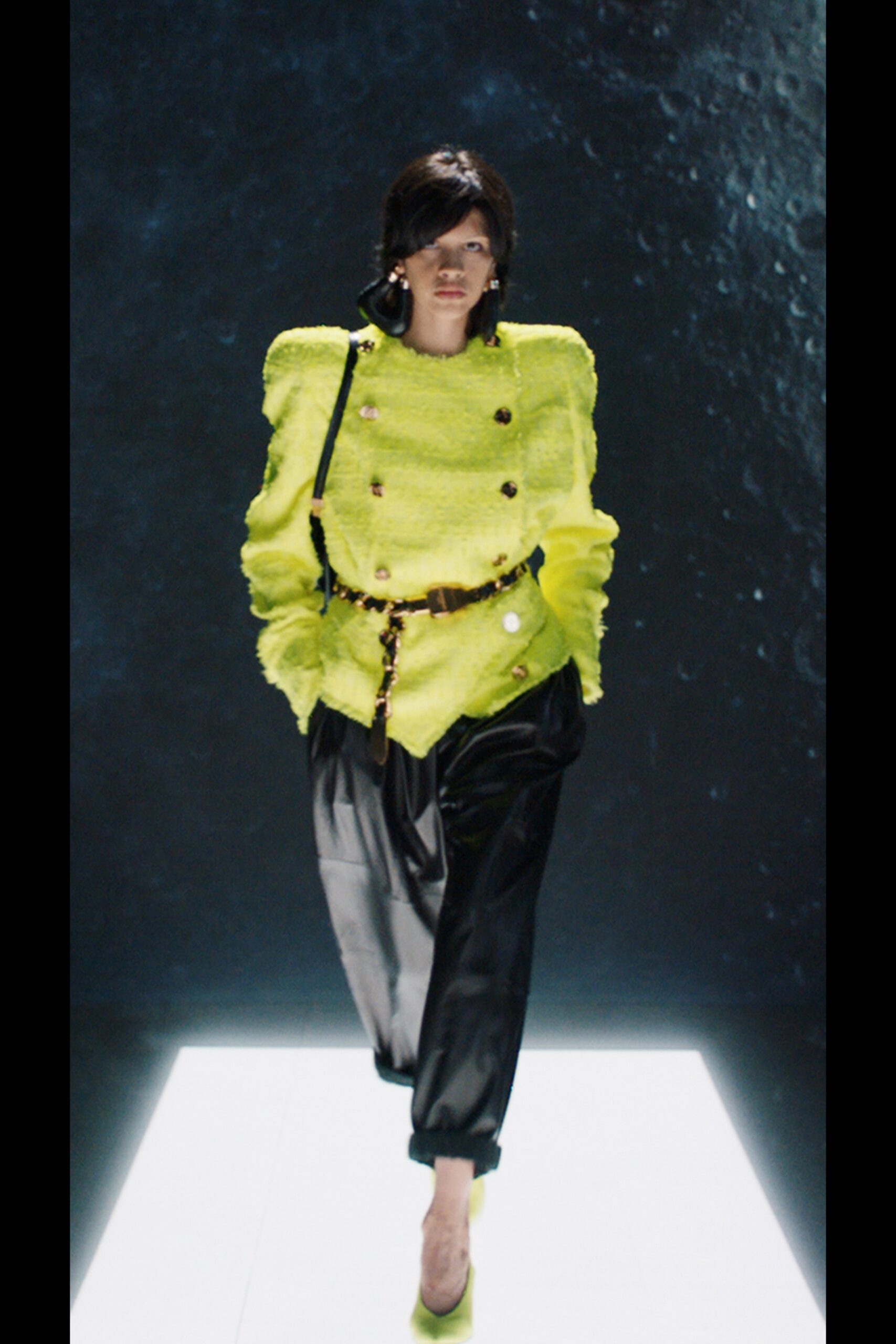 yellow structured blazer with black pants