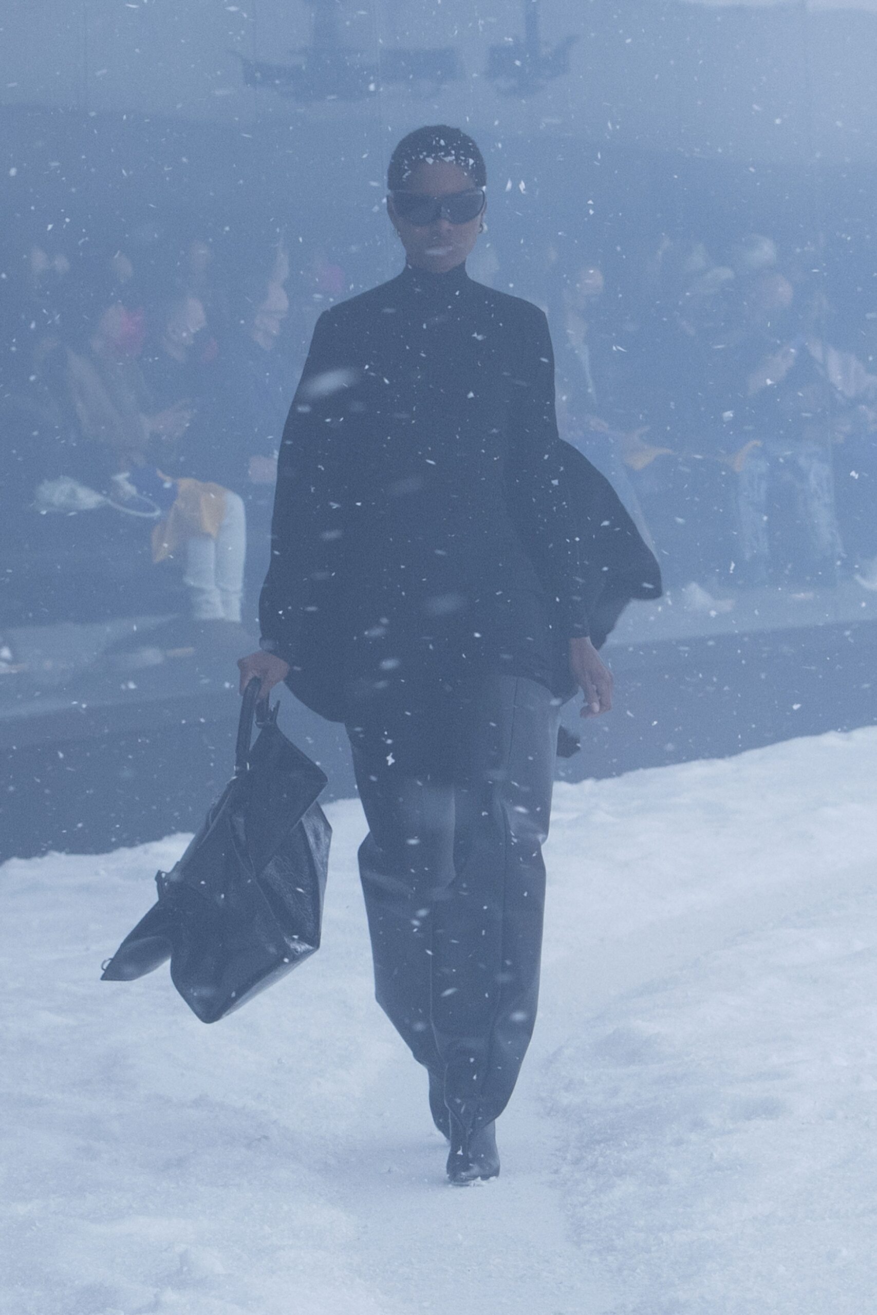 black wool coat and leather pants