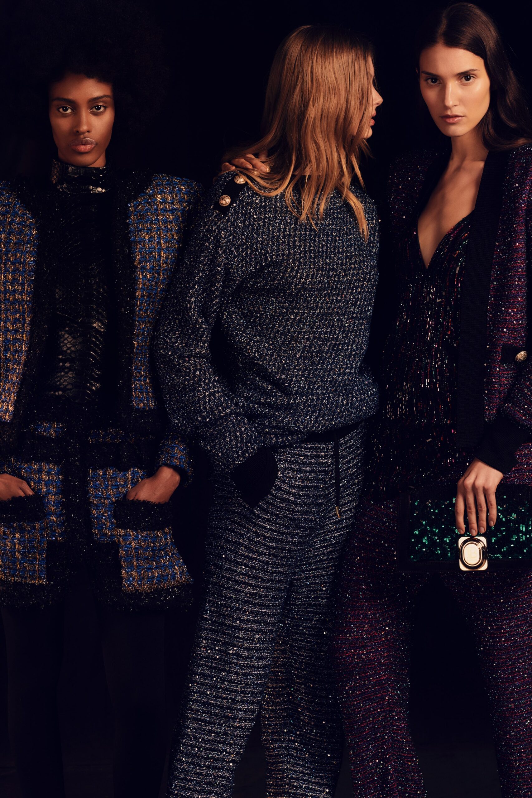 black sequined sleeveless jumpsuit