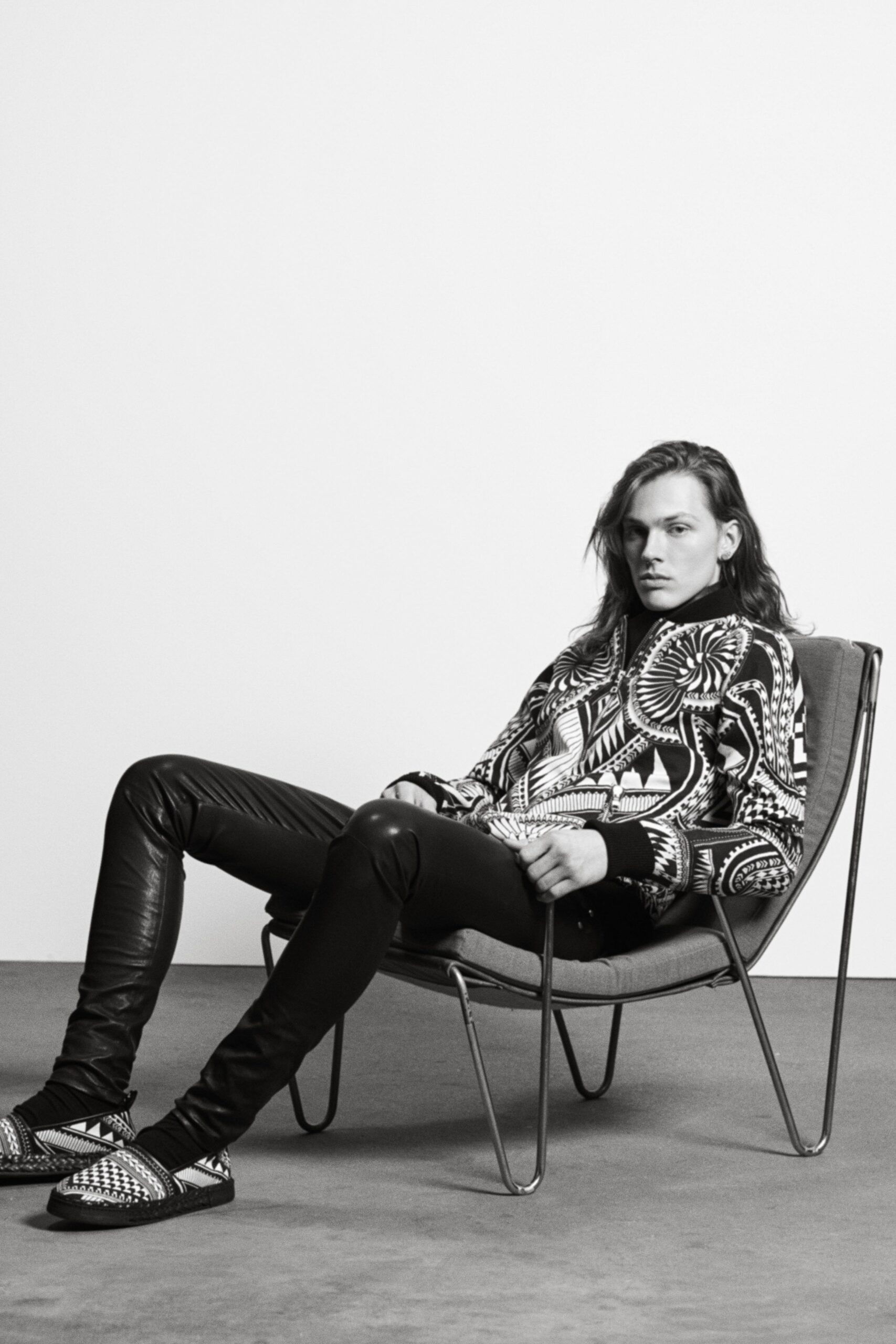 black and white printed jacket with leather pants