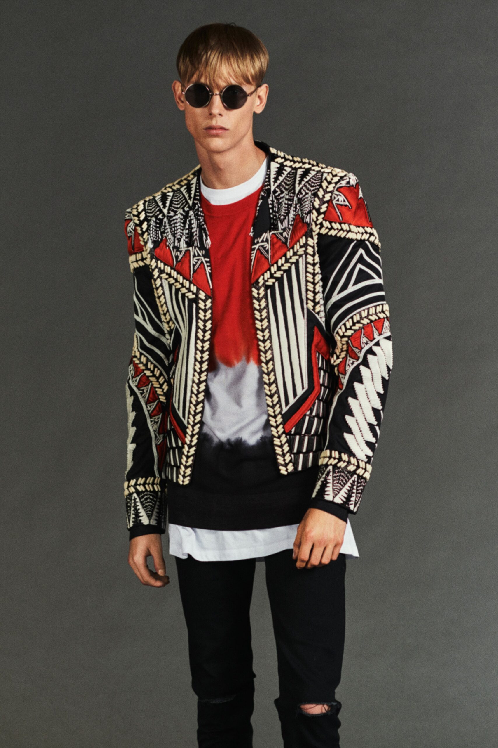 embroidered black jacket with t-shirt and jeans