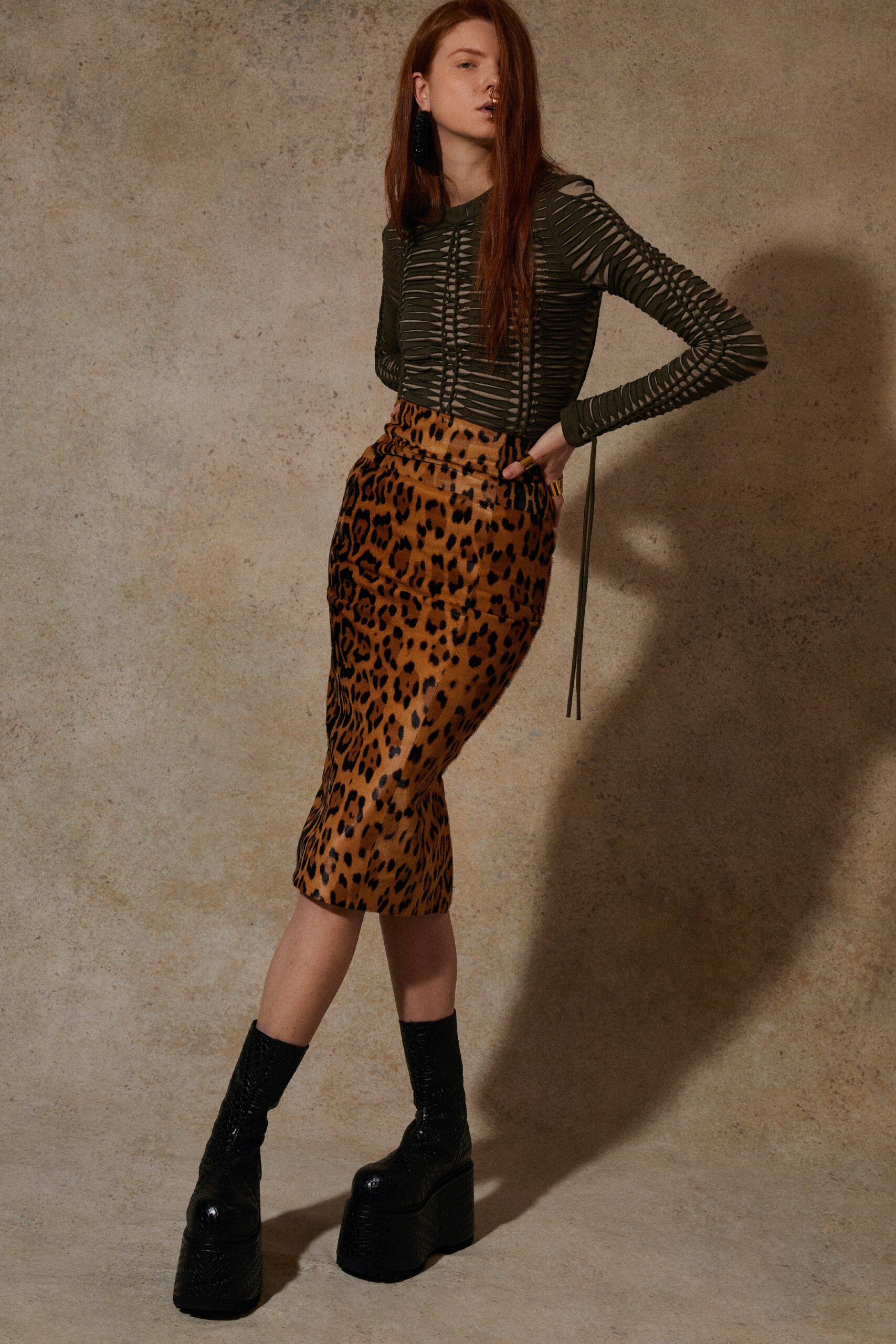 fitted green top and brown skirt