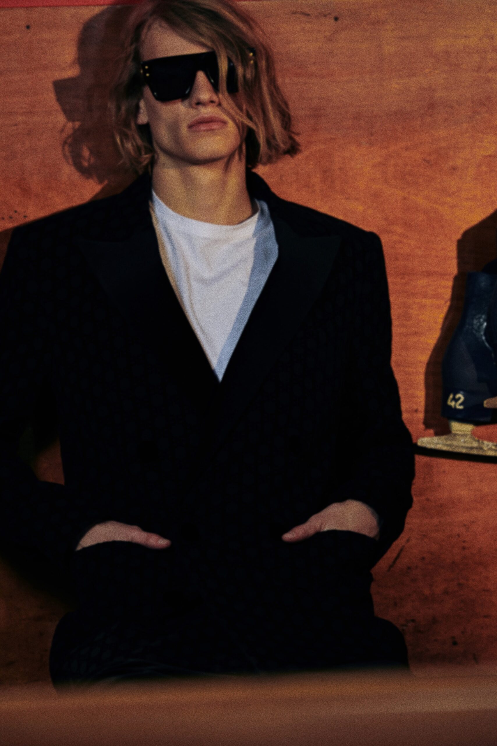 black cotton long-sleeve collared tailored textured blazer