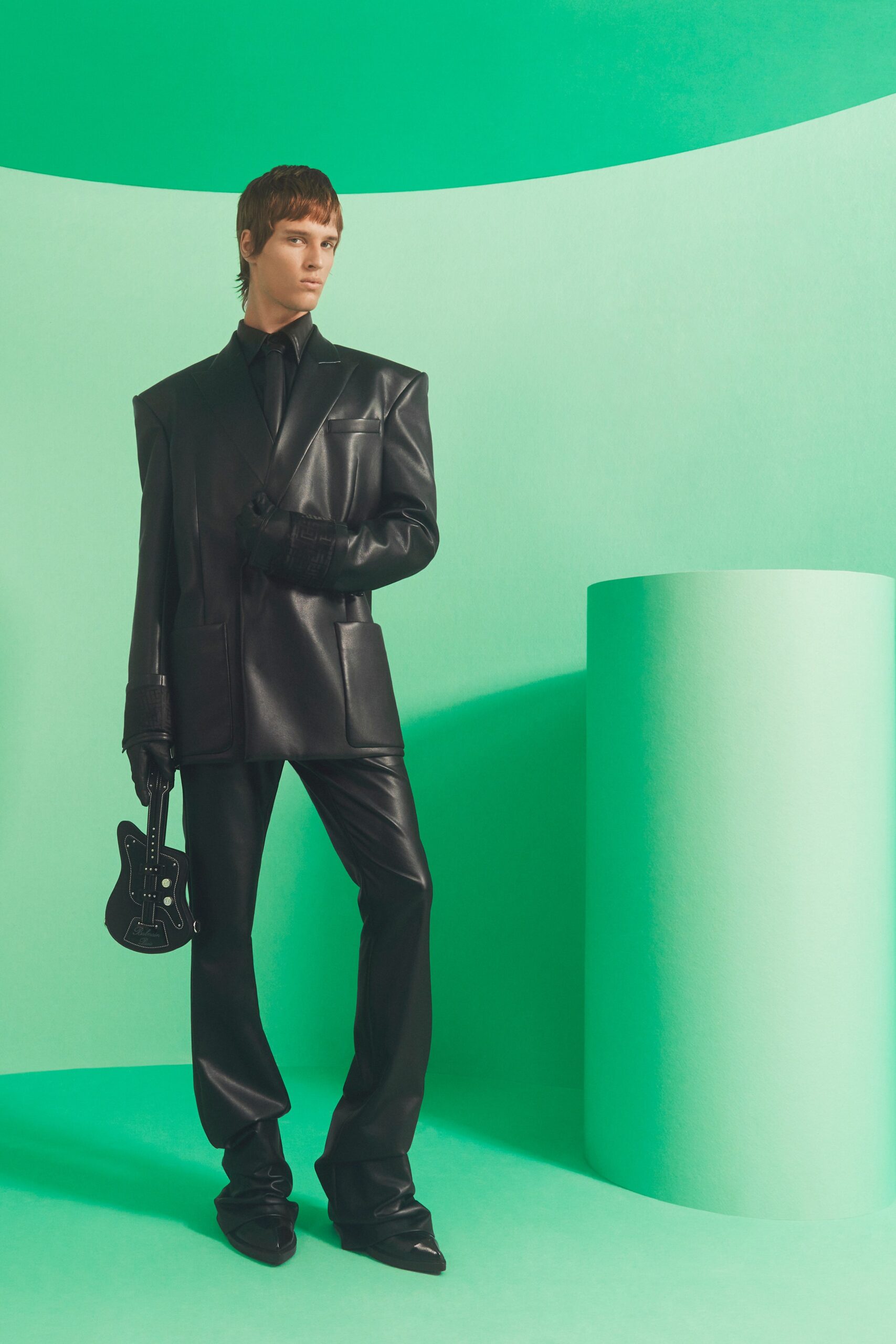 black leather structured blazer and fitted pants
