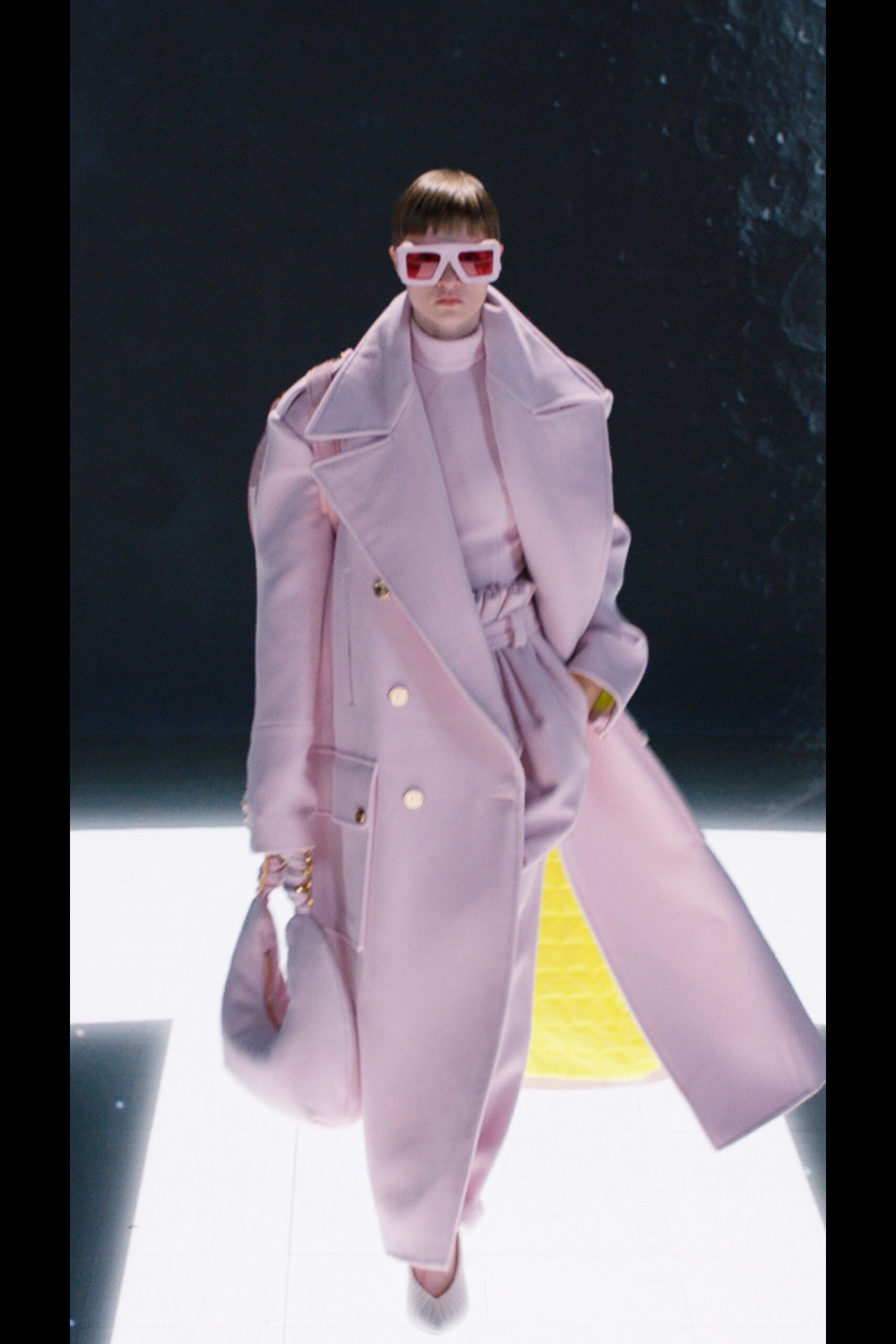 pink oversized coat and jumpsuit