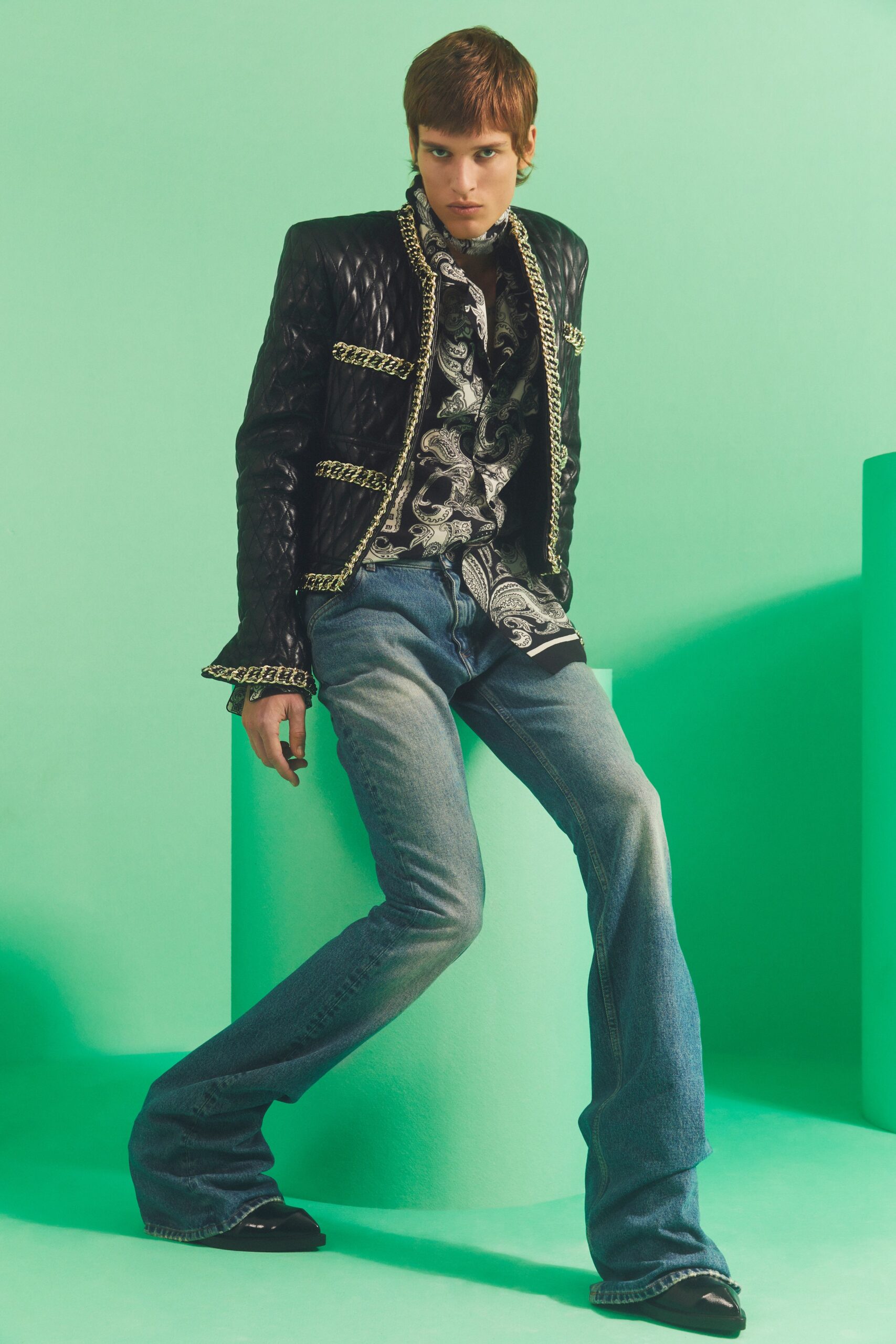 black leather jacket with printed shirt
