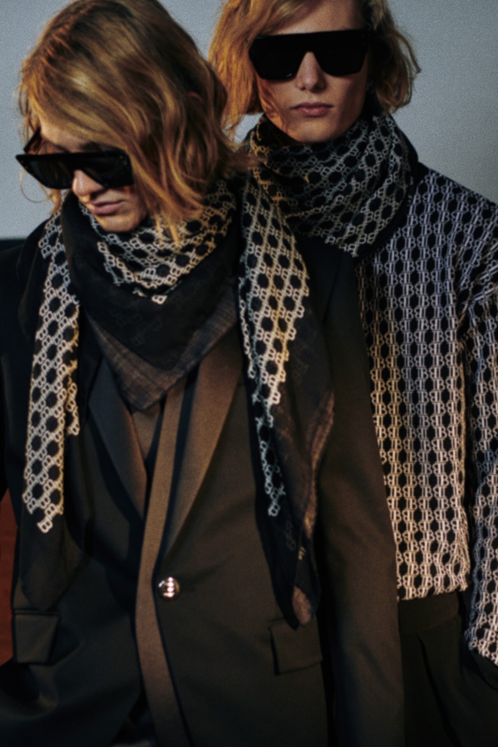 black tailored blazer with printed scarf