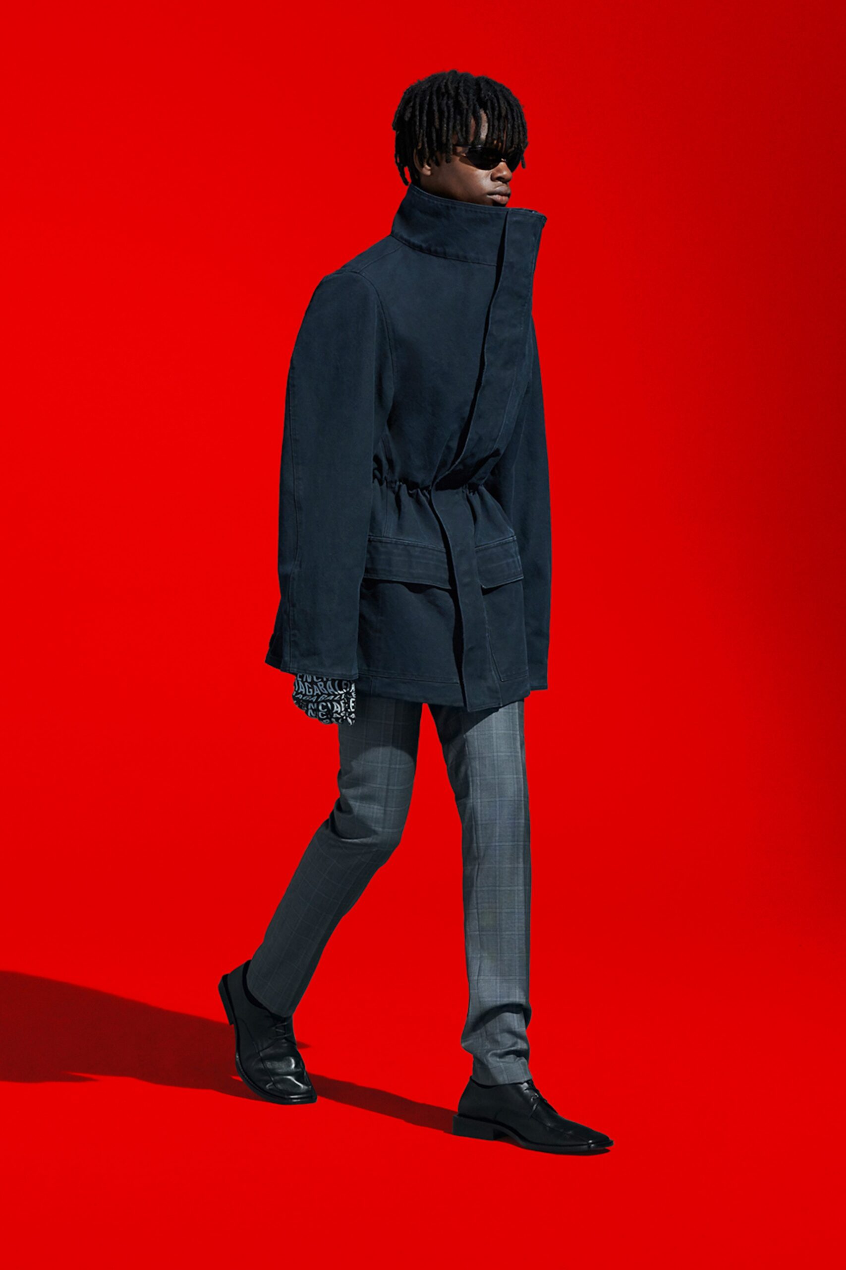black relaxed jacket gray tailored pants