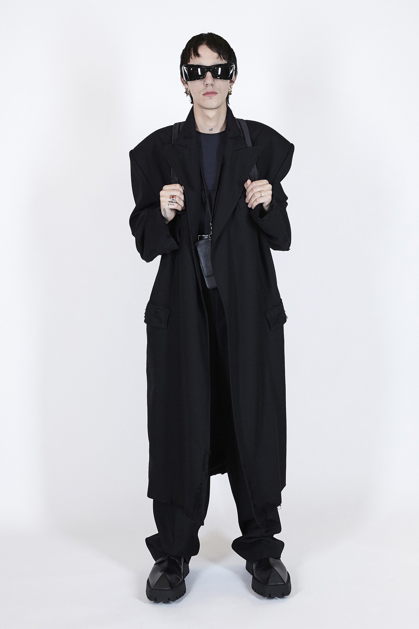 oversized black coat with relaxed pants