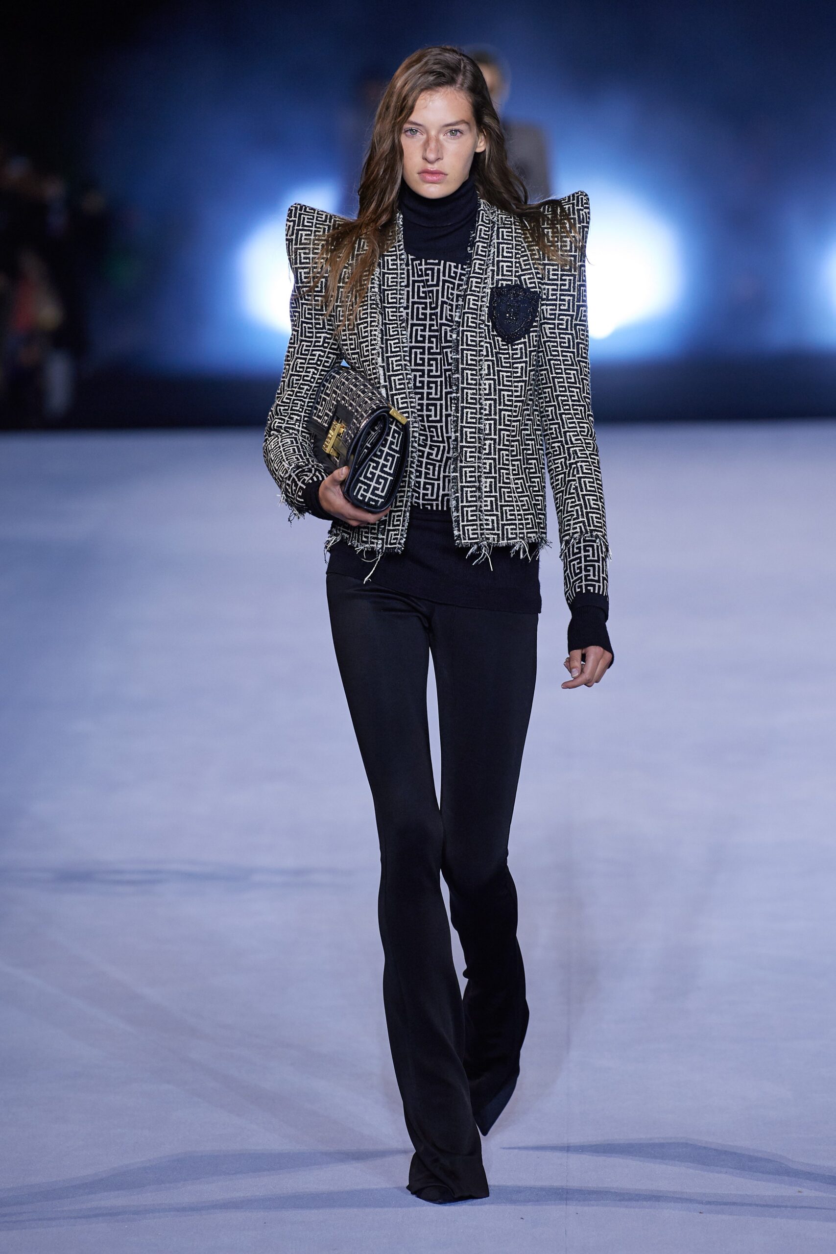 black and white fitted blazer with flared pants