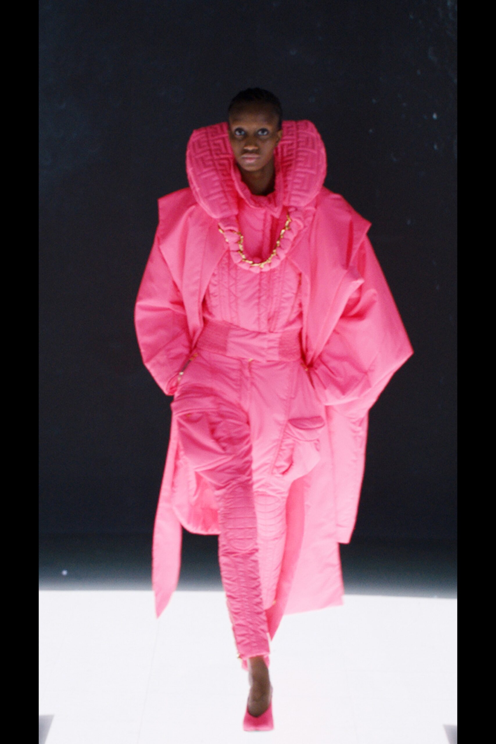 oversized pink coat with jumpsuit