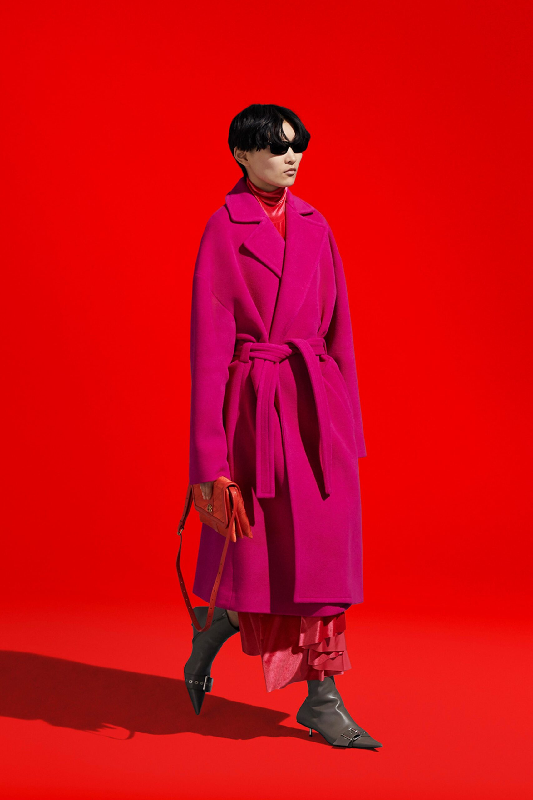 pink wool belted coat and red silk dress
